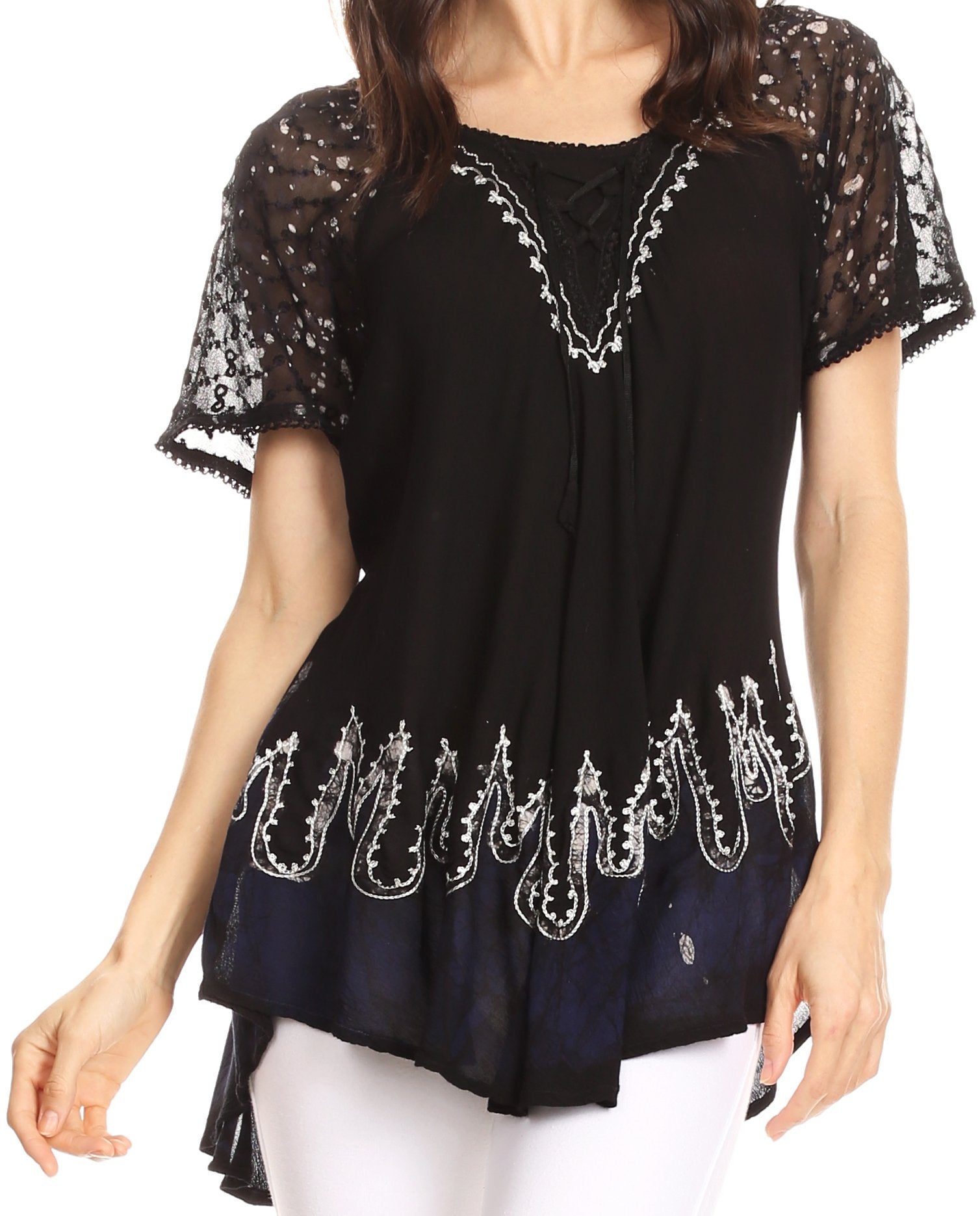 Black top with lace sleeves and white embroidery on a white background