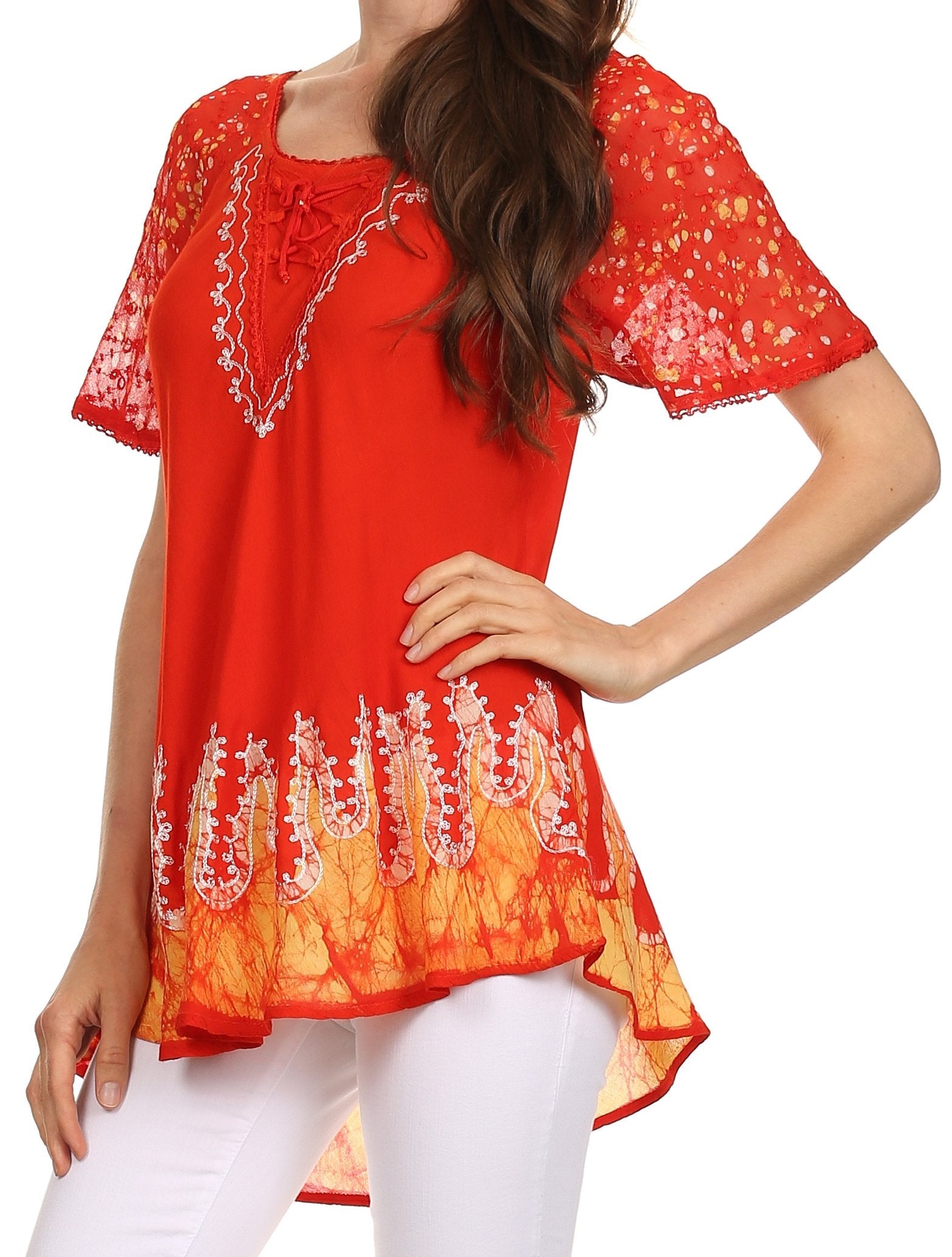Red embroidered blouse worn by a person on a white background