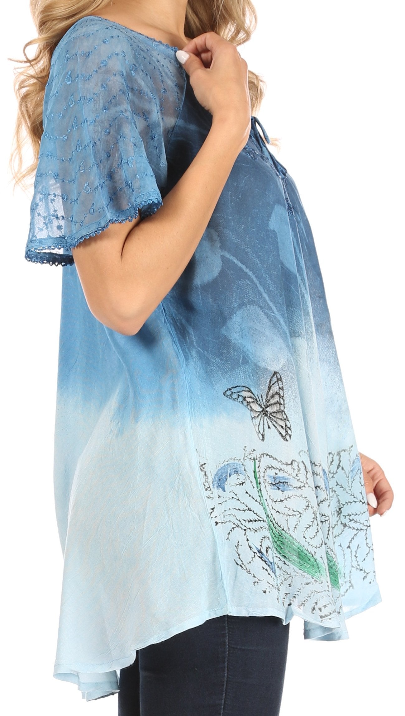 Blue lace top with butterfly design on a white background