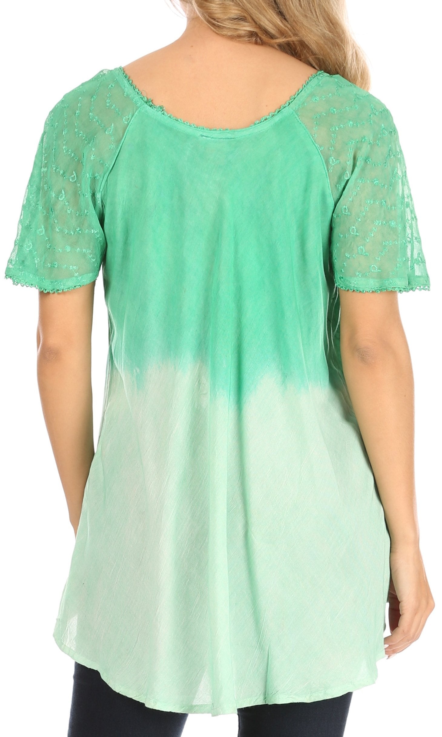 Green and white gradient top worn by a person on a white background