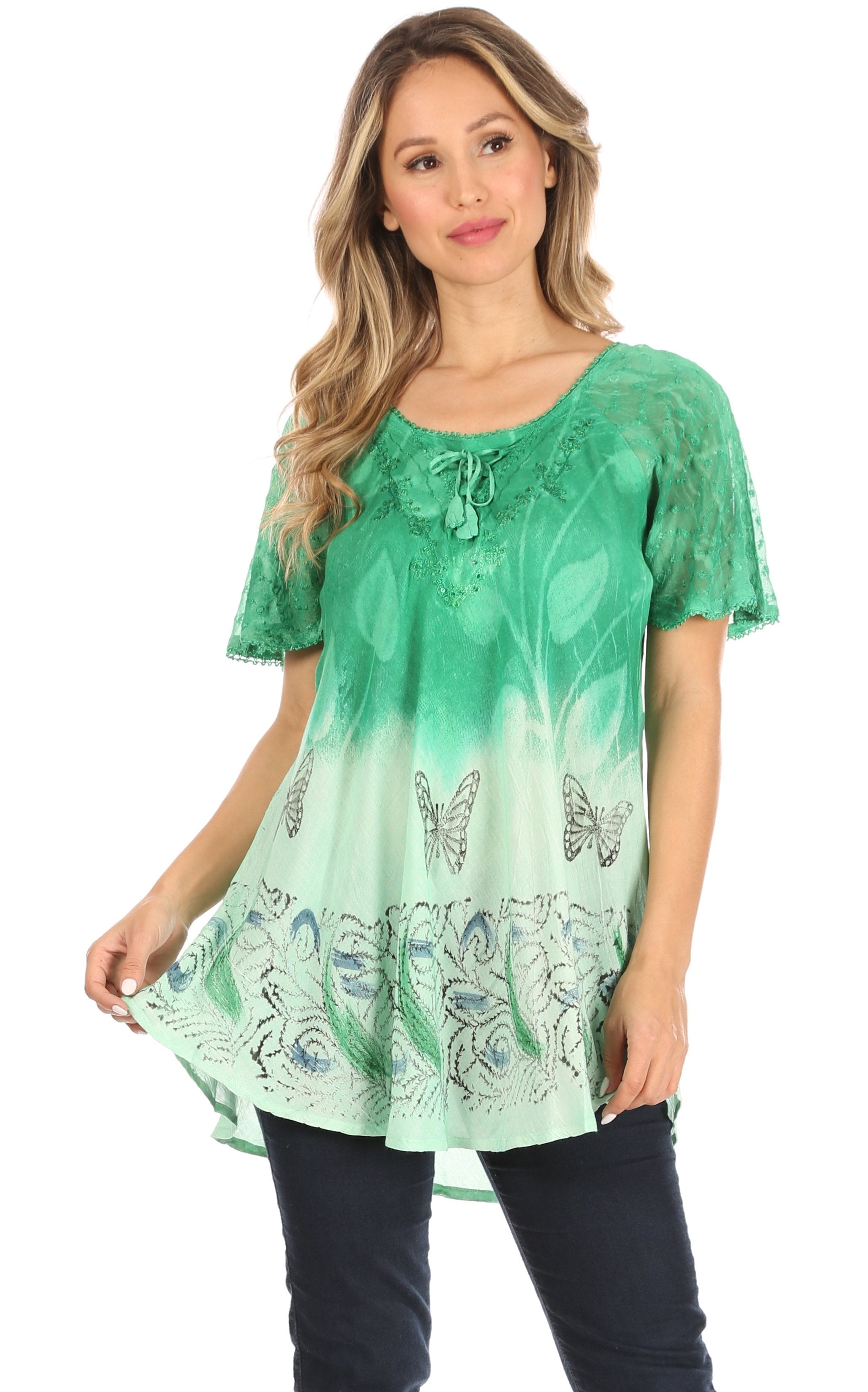 Woman wearing a green patterned blouse with a white background