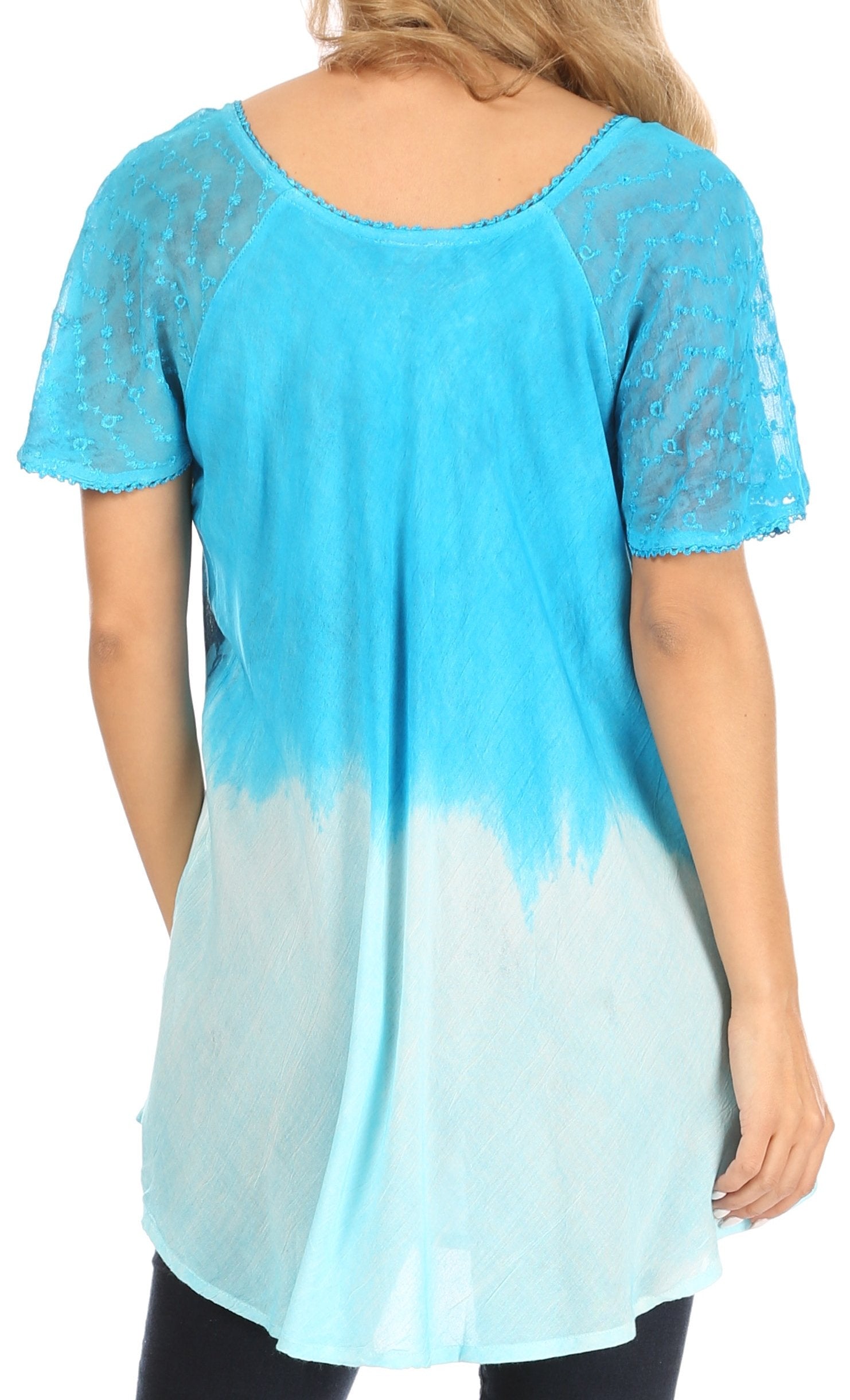 Blue and white gradient tunic with lace detailing on a plain background