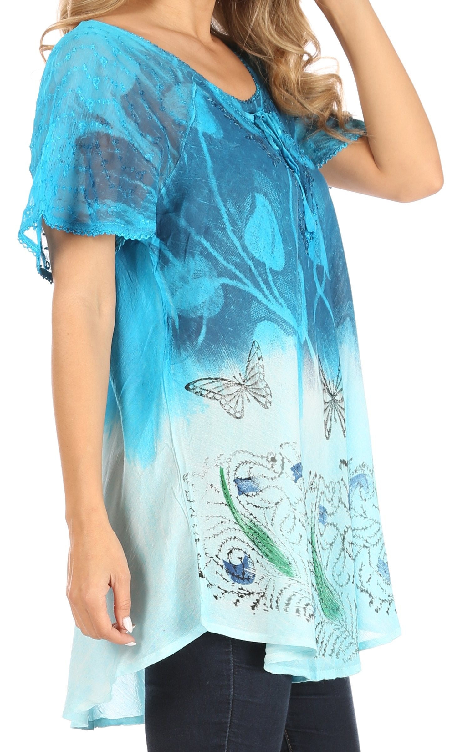 Light blue floral and butterfly patterned top worn by a person