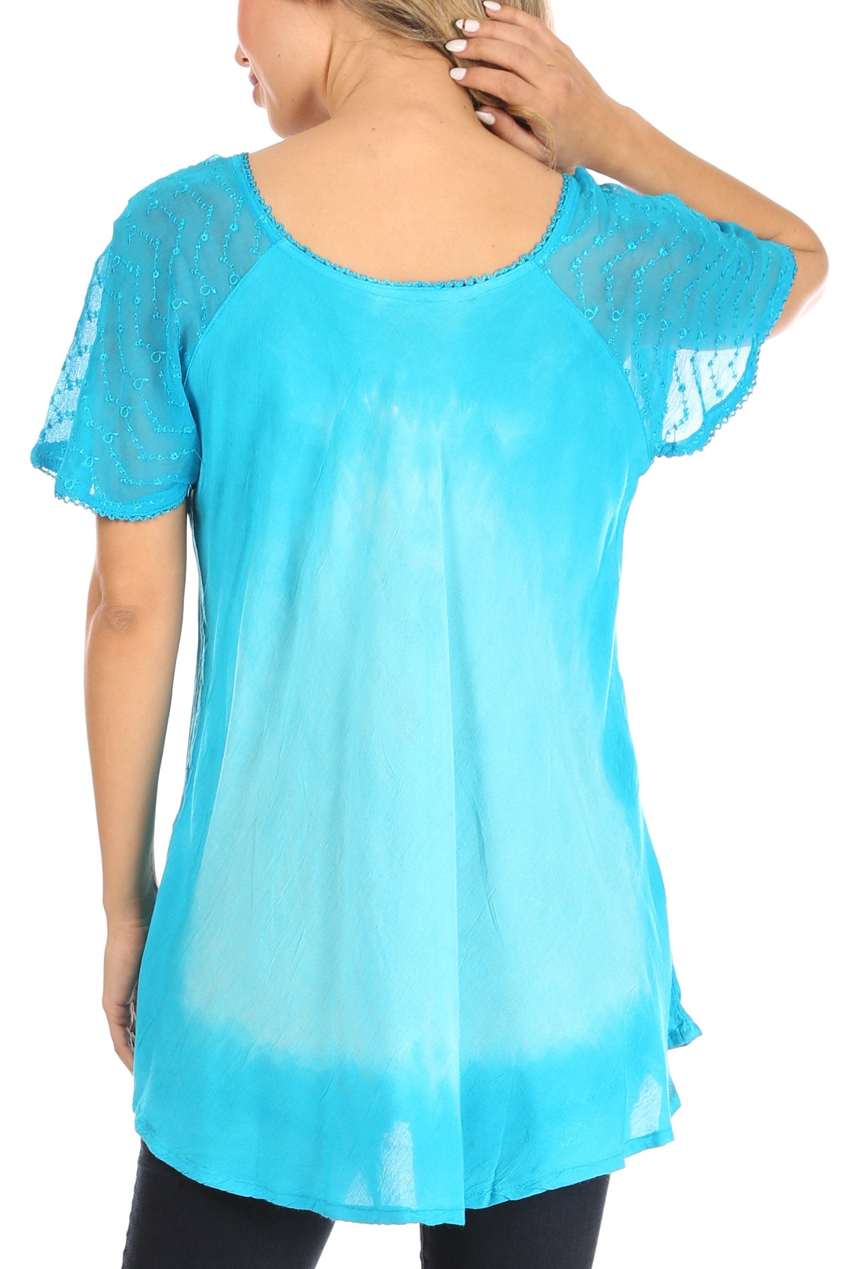 Blue sheer top worn by a person on a white background