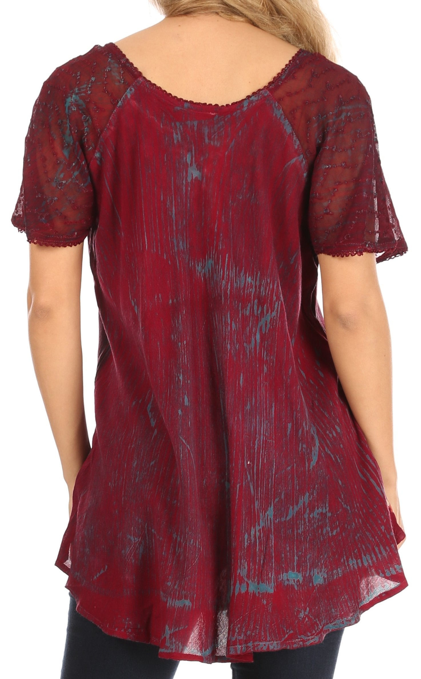 Red patterned top worn by a person, showing the back view.