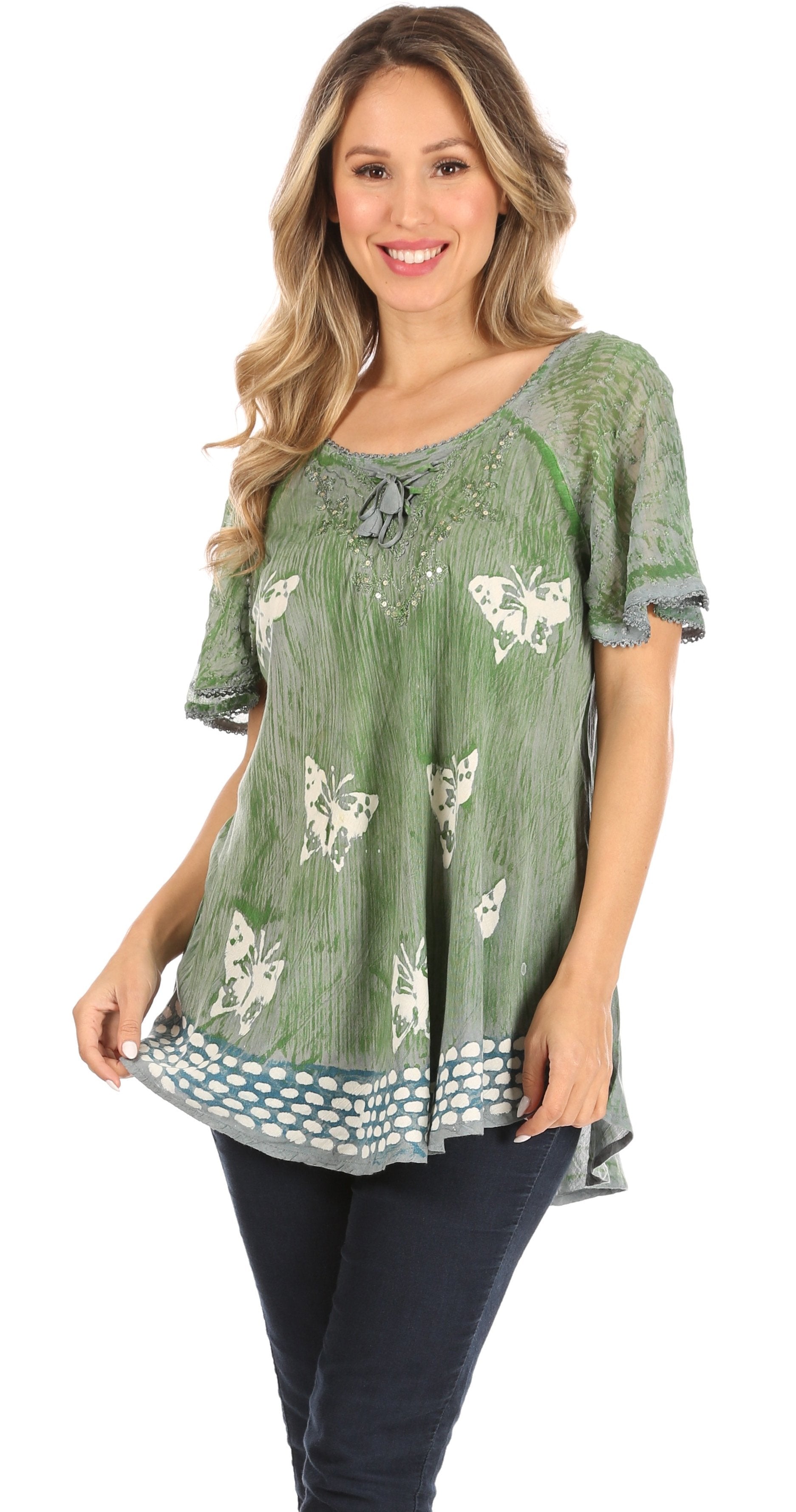 Woman wearing a green floral blouse with a white background