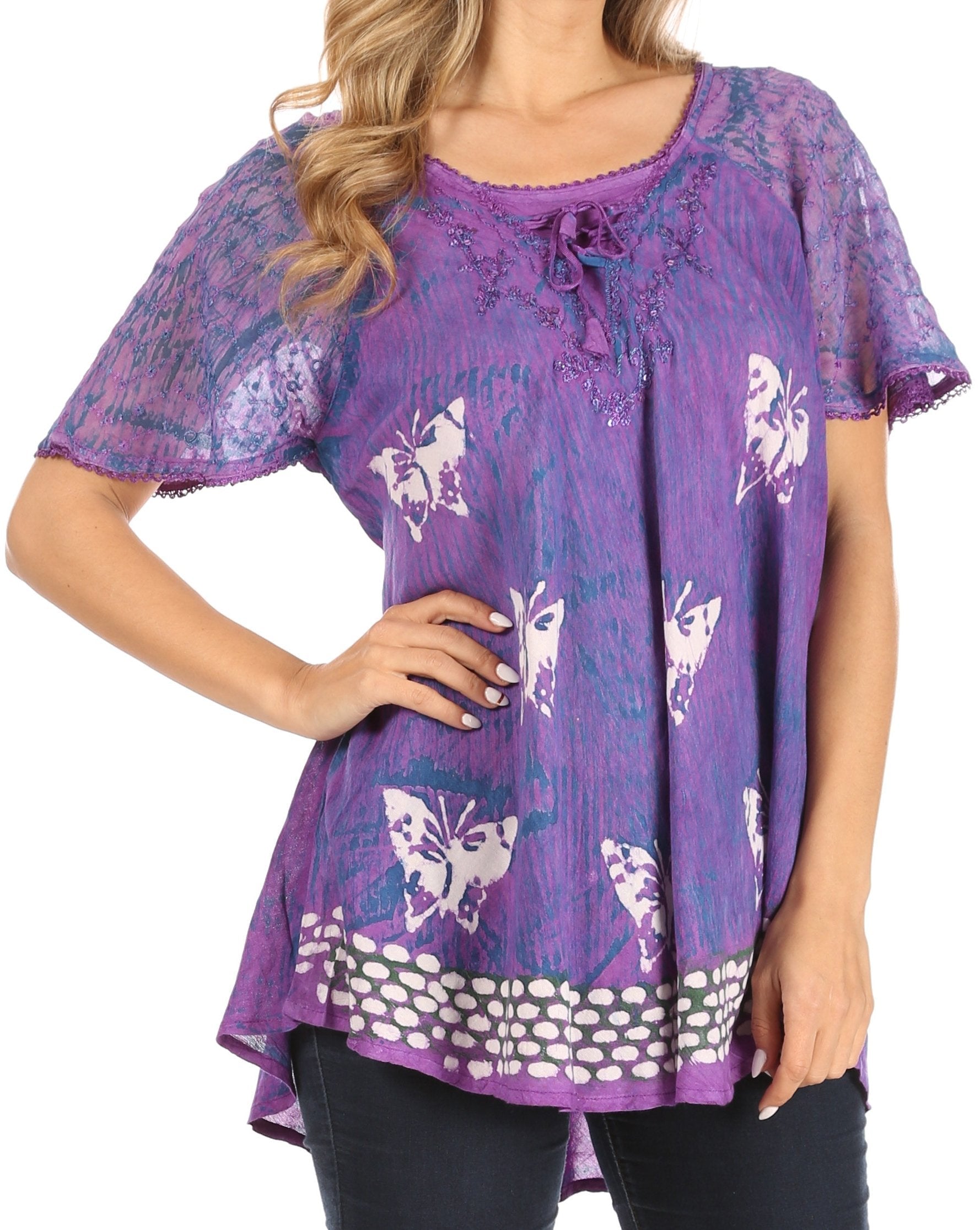 Purple blouse with butterfly pattern worn by a model on a white background