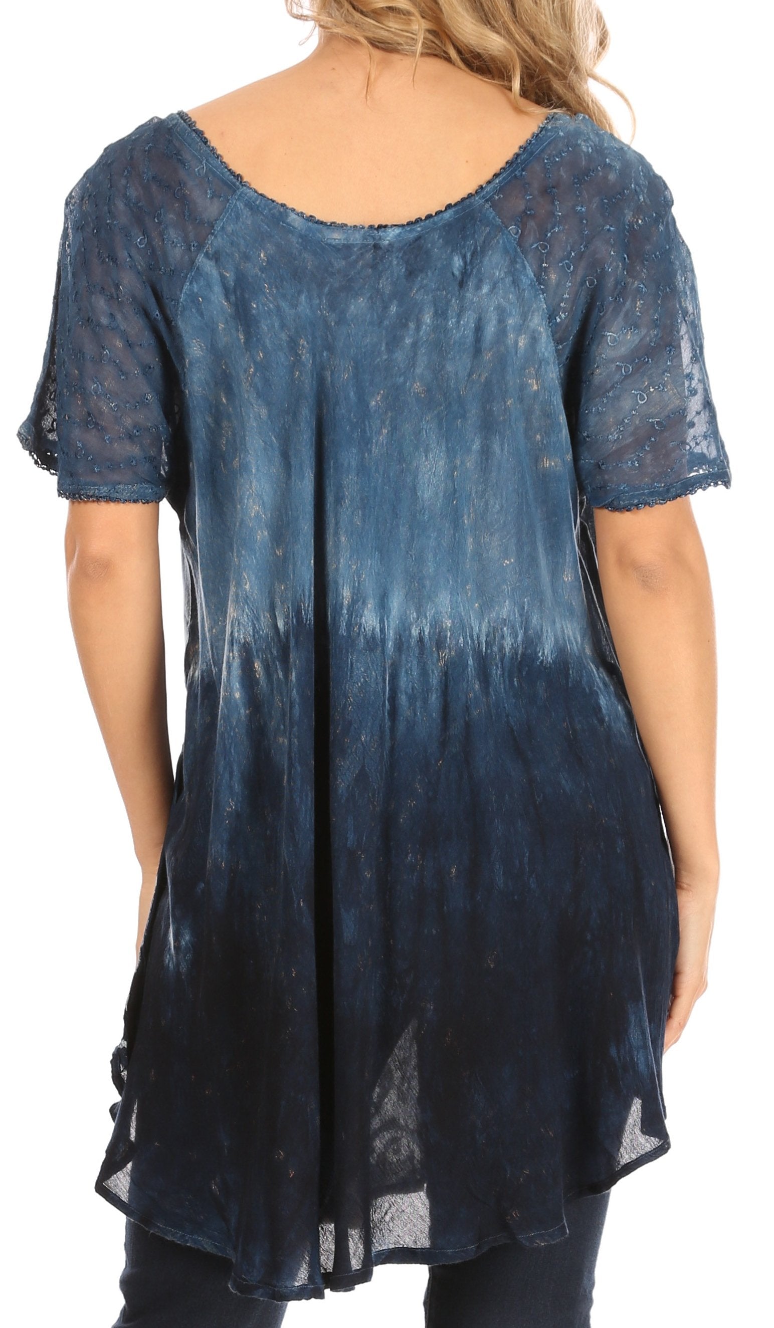 Blue tie-dye tunic worn by a person on a white background