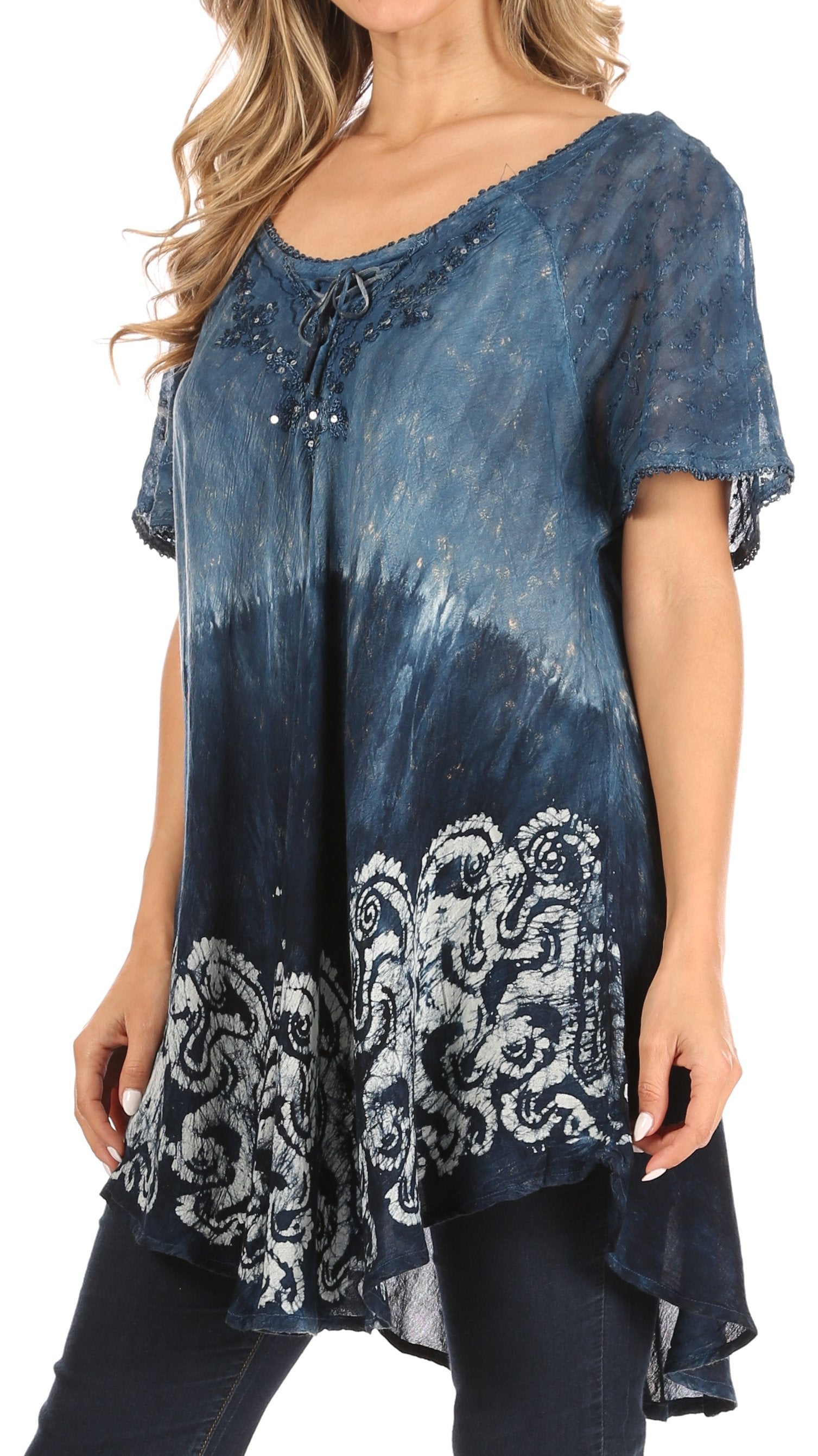 Blue tie-dye t-shirt with white lace details worn by a model on a white background