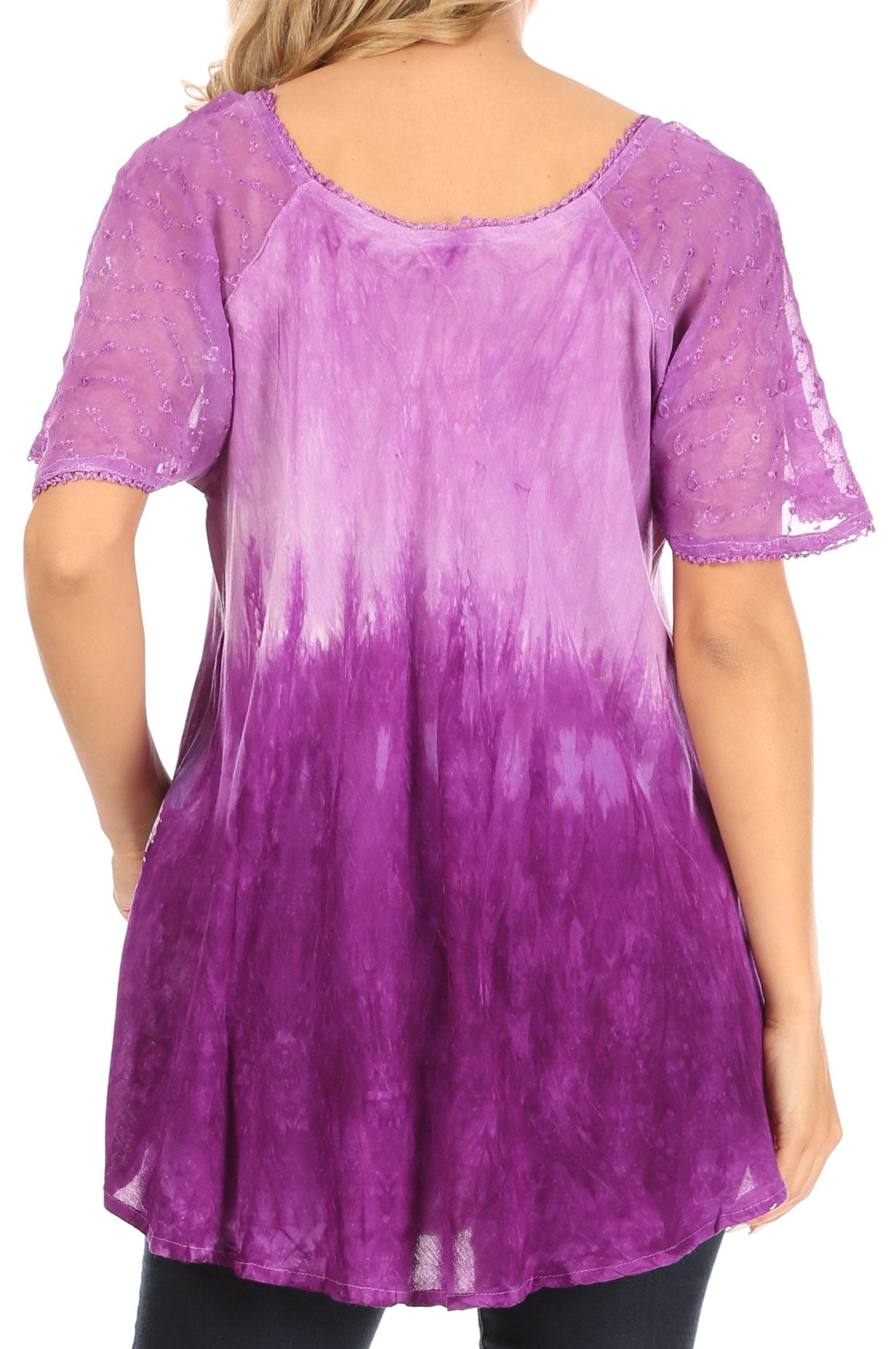 Purple tie-dye tunic worn by a person on a white background