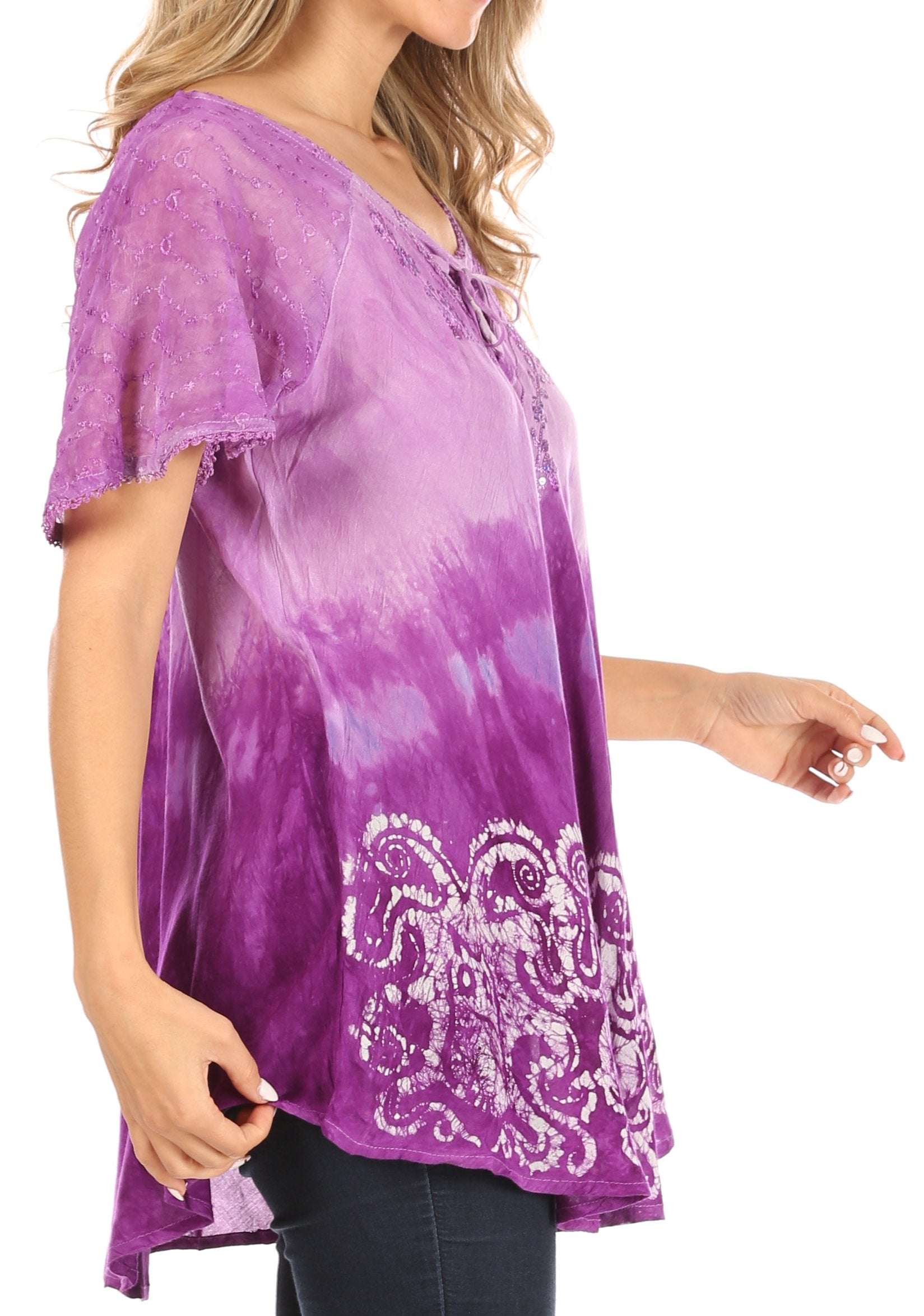 Purple tie-dye shirt with white floral patterns on a white background