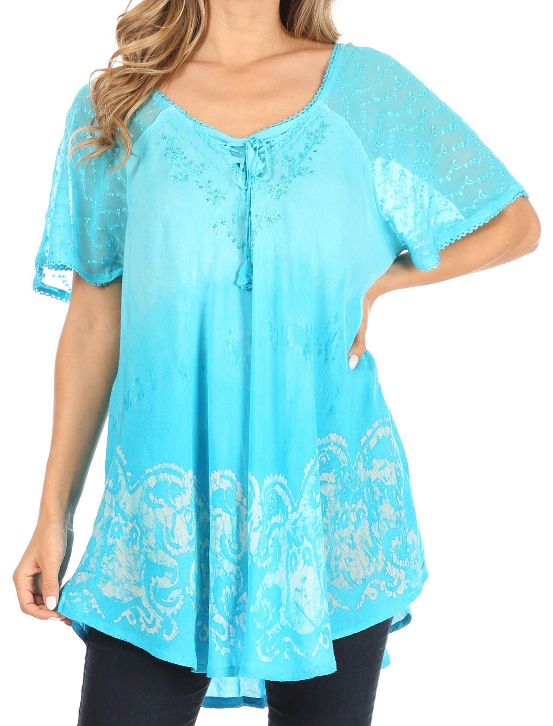 Light blue lace top worn by a model on a white background