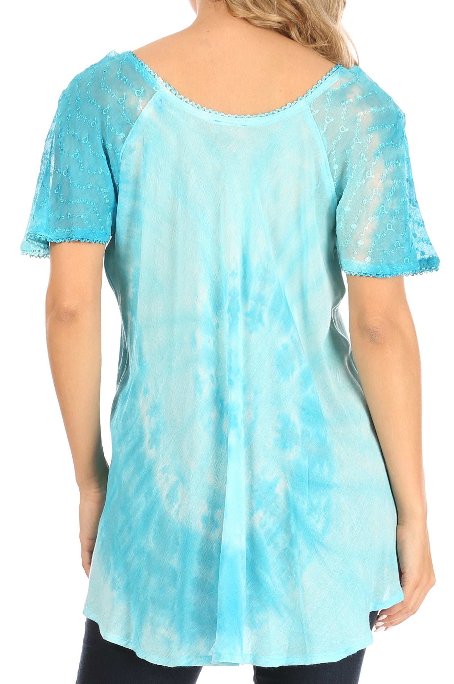 Light blue tie-dye tunic with sheer sleeves worn by a person