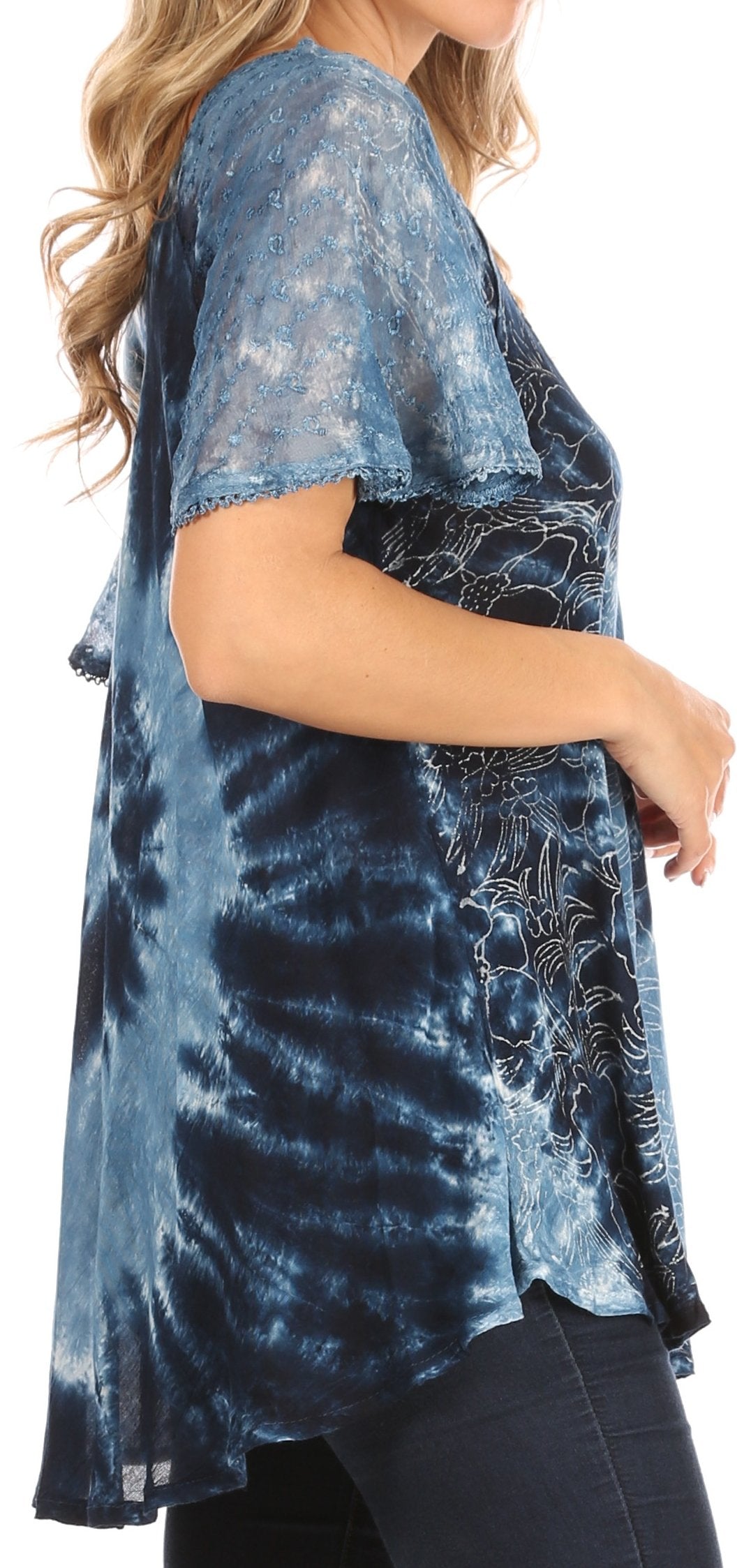 Blue tie-dye shirt with floral embroidery on a white background