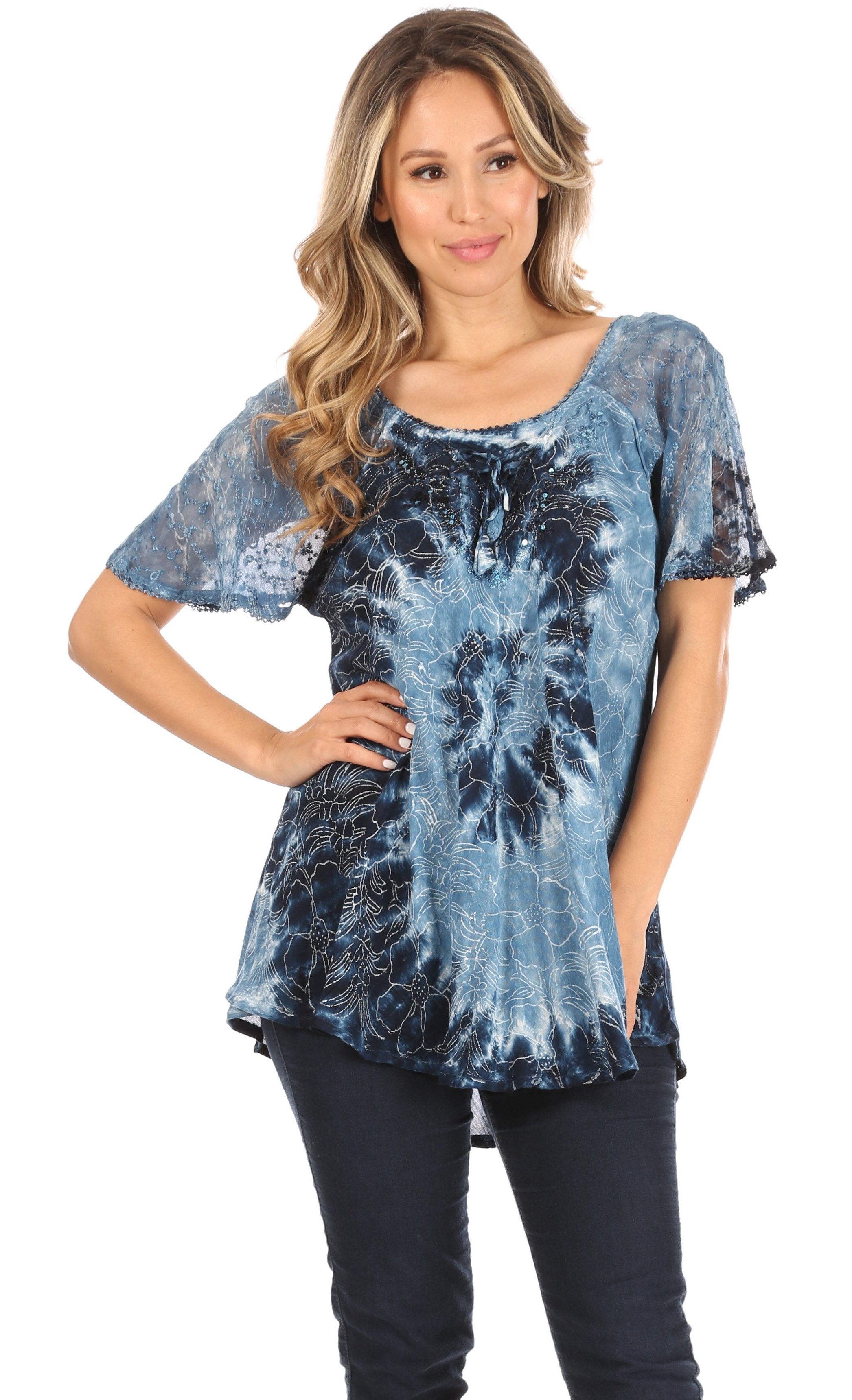 Woman wearing a blue tie-dye top on a white background