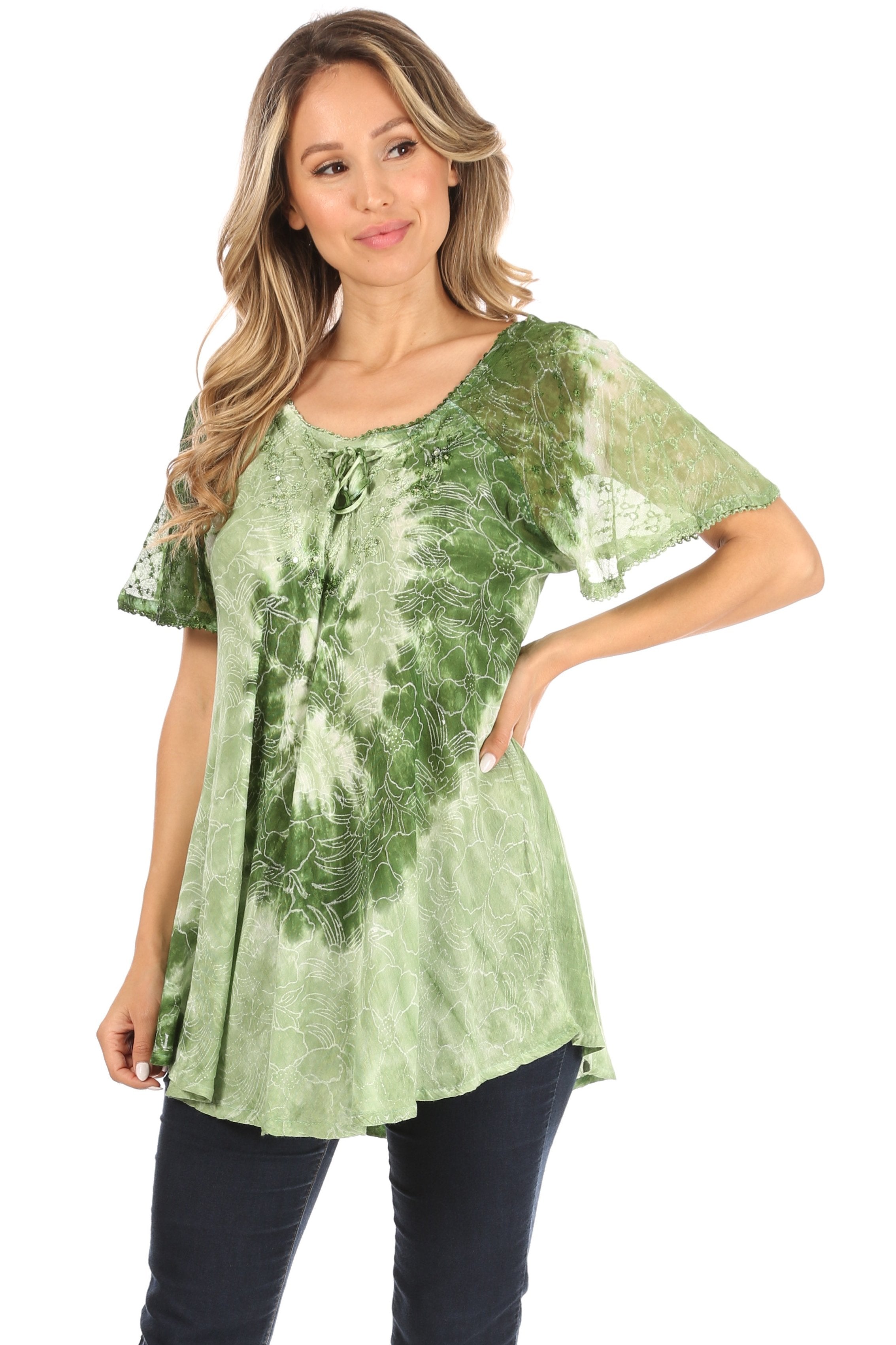 Woman wearing a green tie-dye top on a white background
