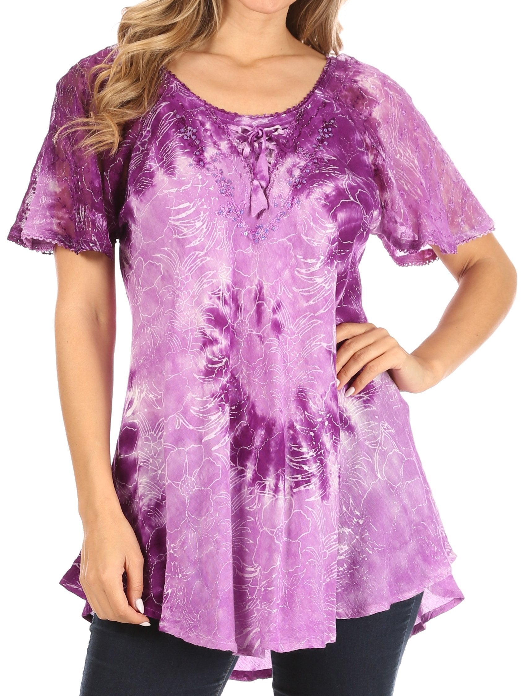 Purple tie-dye tunic worn by a model on a white background