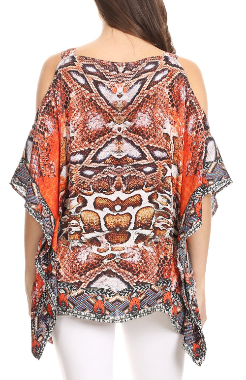 Woman wearing a patterned top with a white background