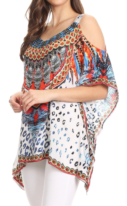 Colorful patterned top worn by a model on a white background
