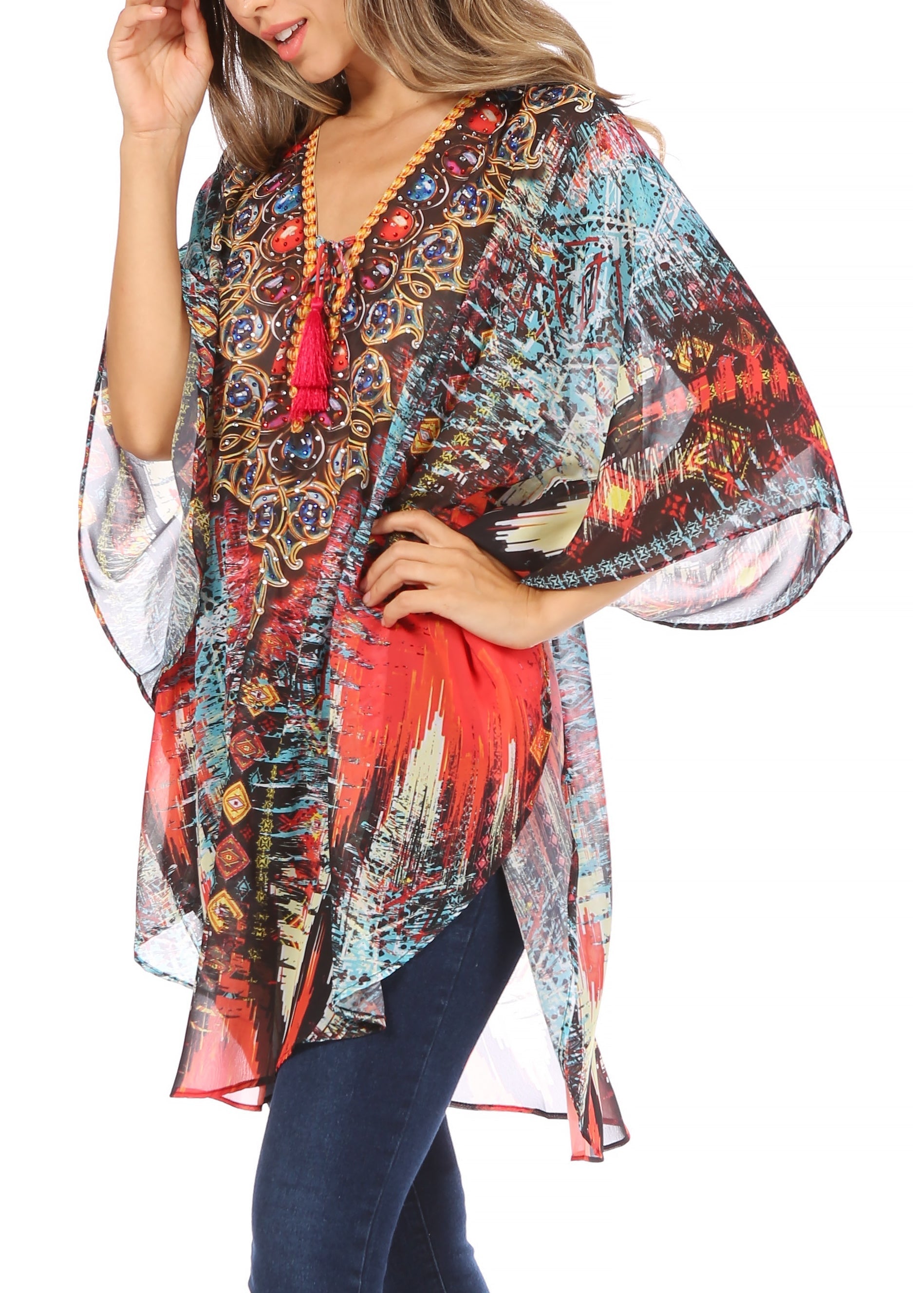 Woman wearing a colorful patterned kimono-style top on a white background