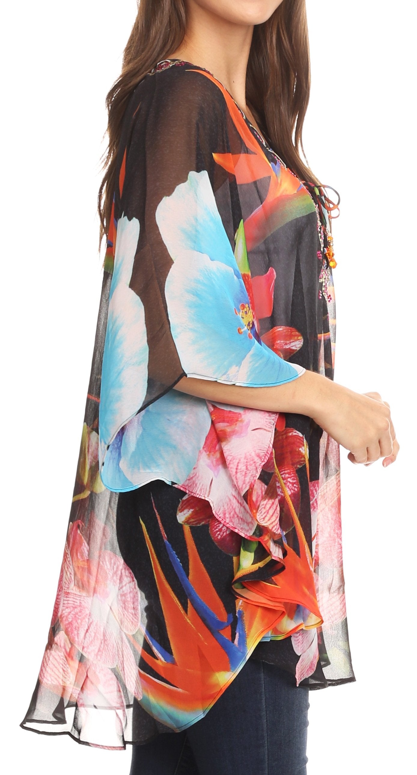 Colorful floral kimono-style garment on a model with a white background