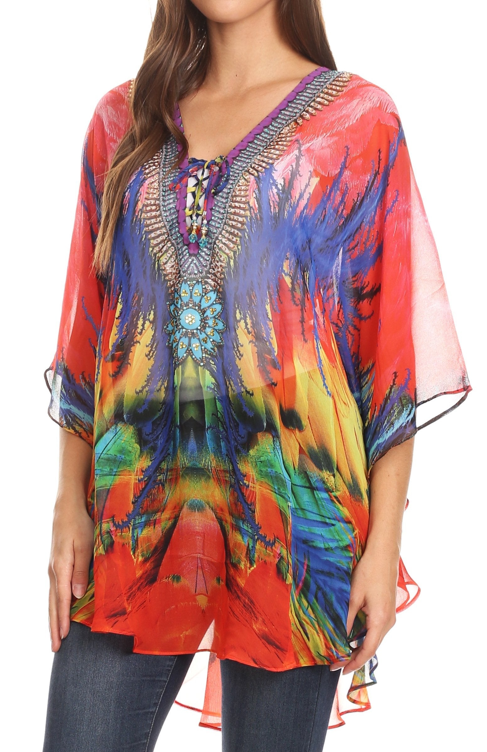 Colorful tie-dye top worn by a model on a white background