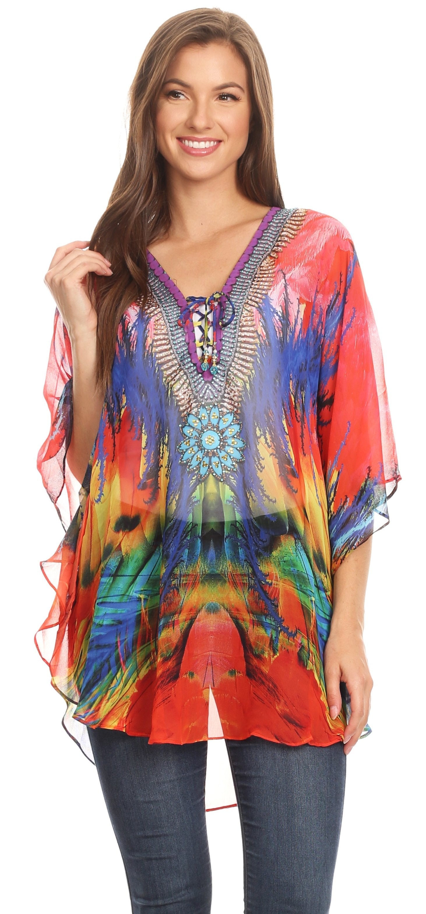 Woman wearing a colorful tie-dye top with a white background