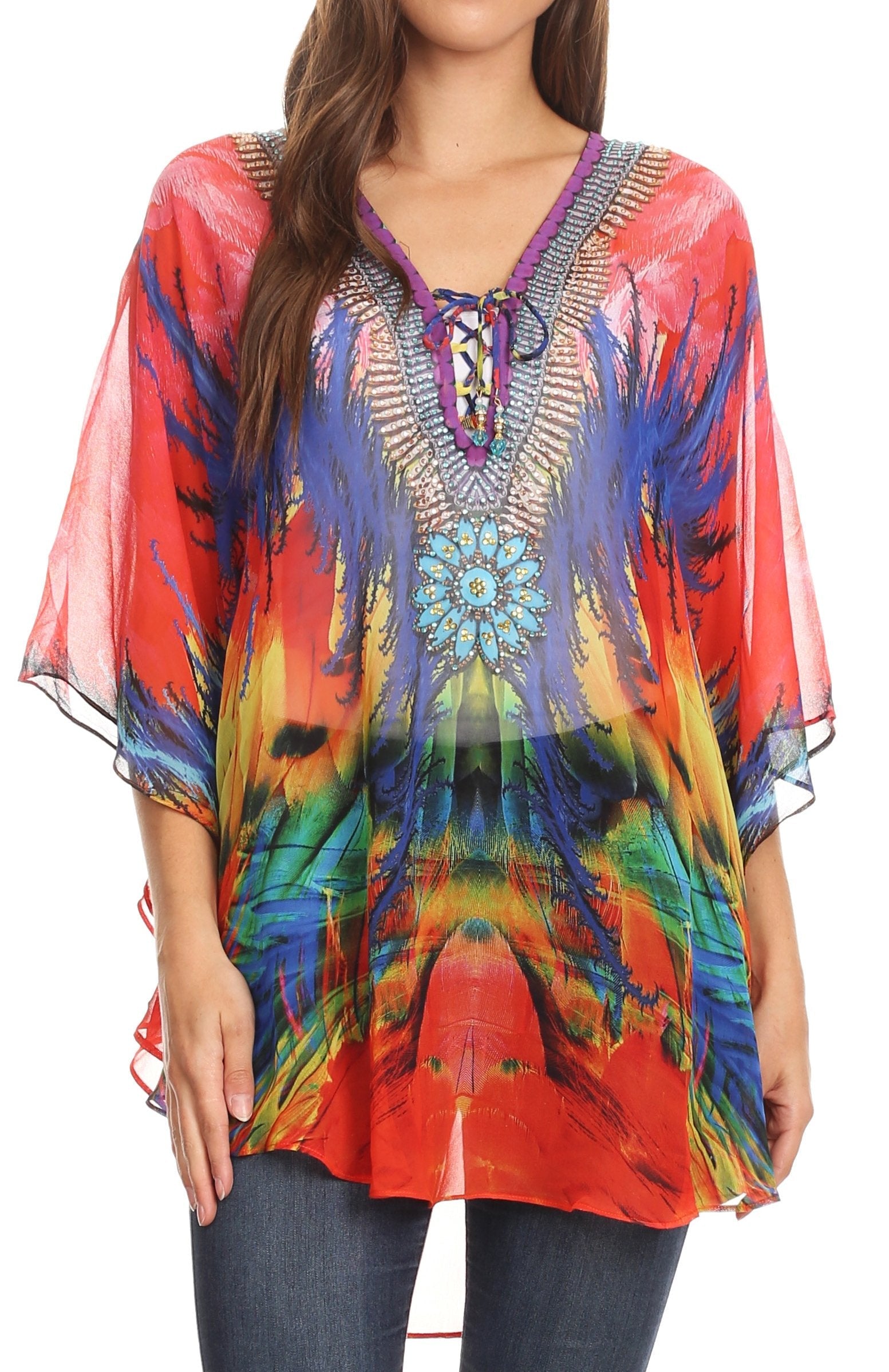 Colorful tie-dye top with a lace-up front worn by a model on a white background
