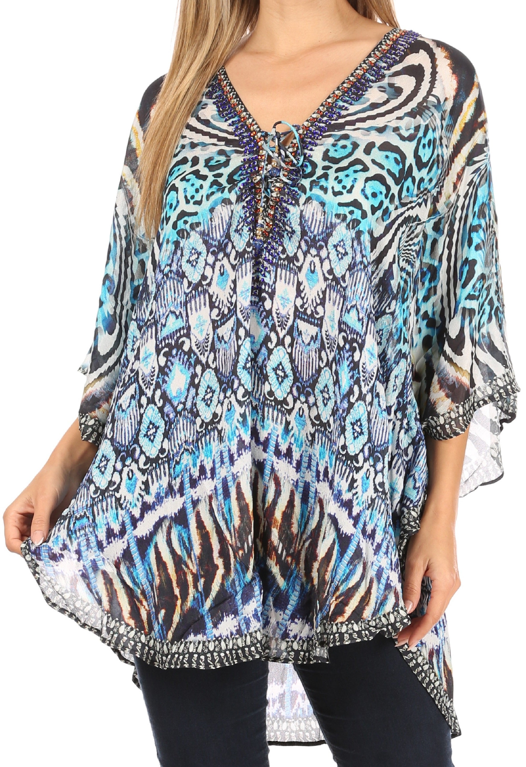Patterned tunic with a V-neck and three-quarter sleeves on a white background