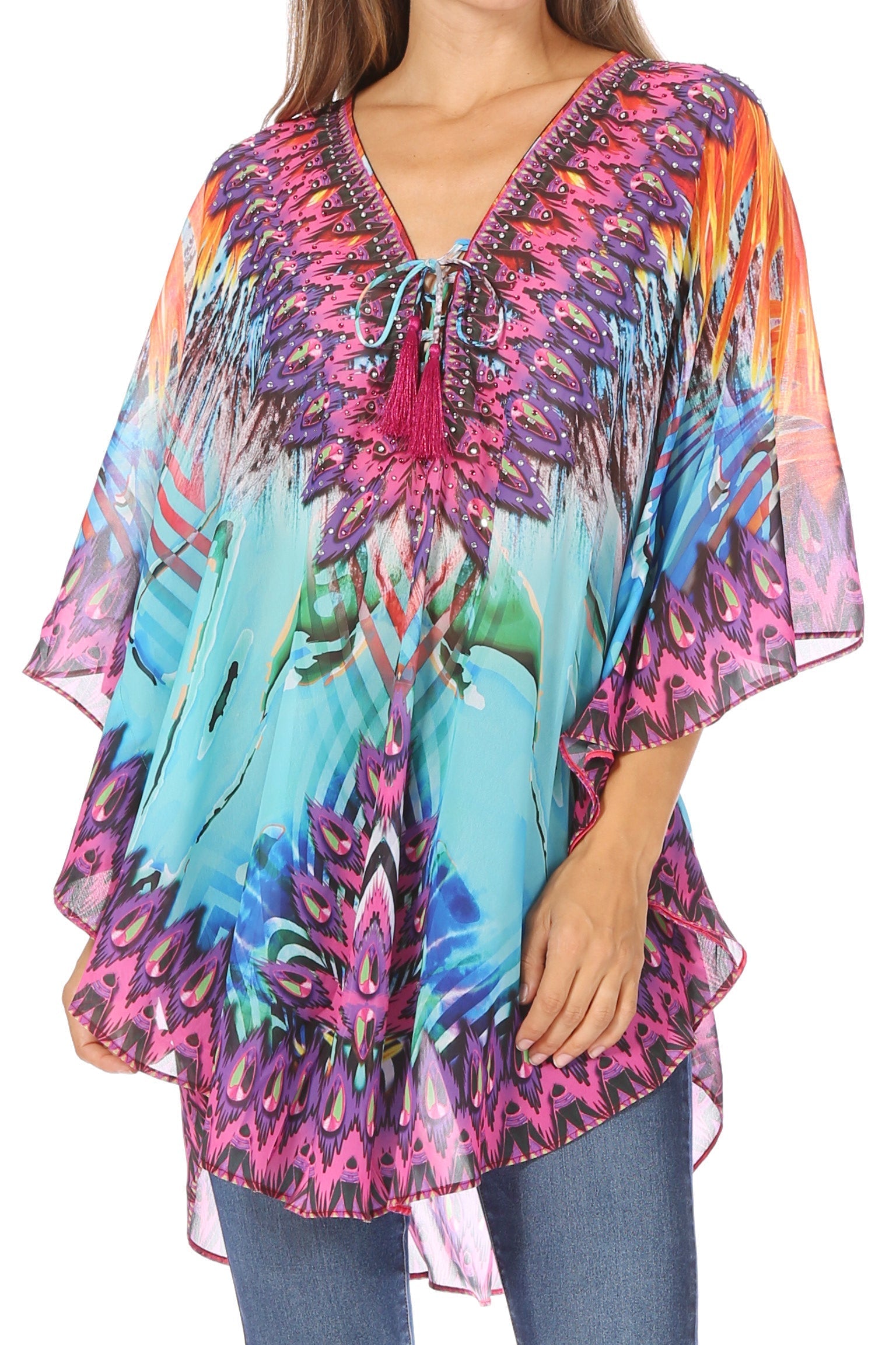 Colorful patterned top worn by a person on a white background