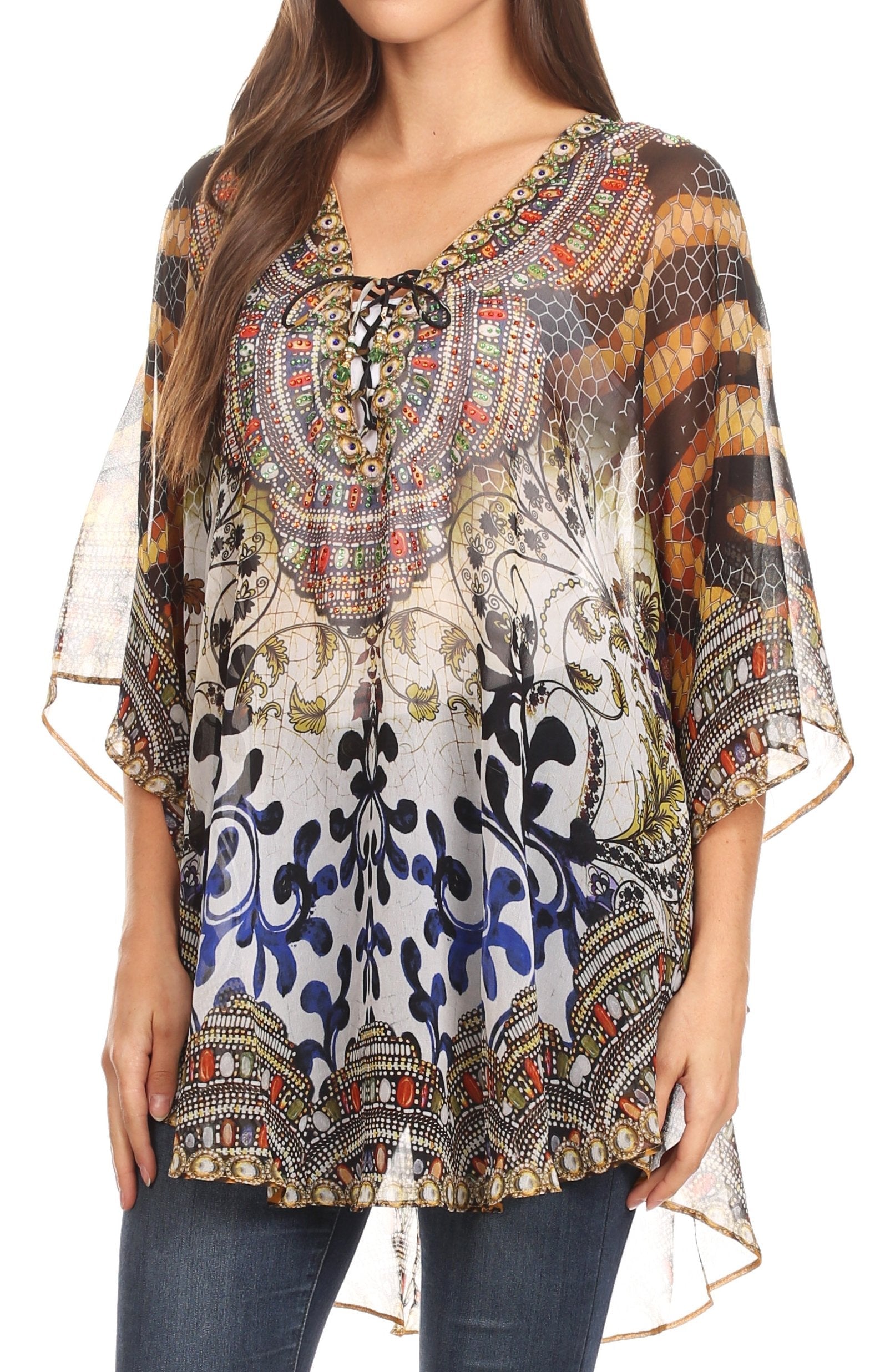 Woman wearing a colorful patterned blouse with long sleeves on a white background