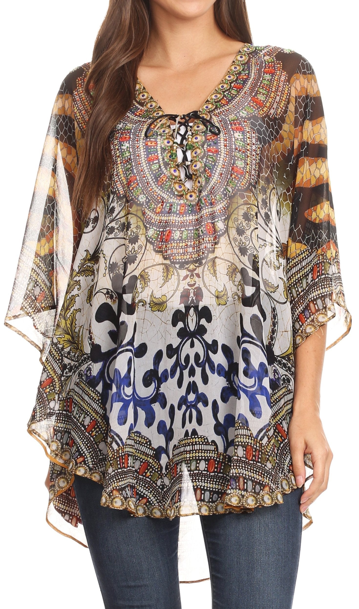 Woman wearing a colorful patterned blouse with sheer sleeves on a white background