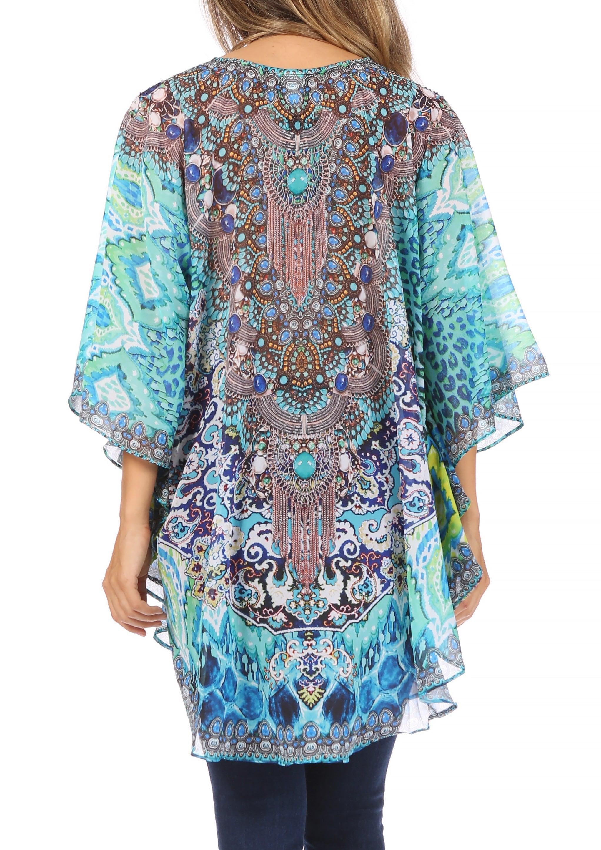 Woman wearing a colorful patterned kimono-style top on a white background