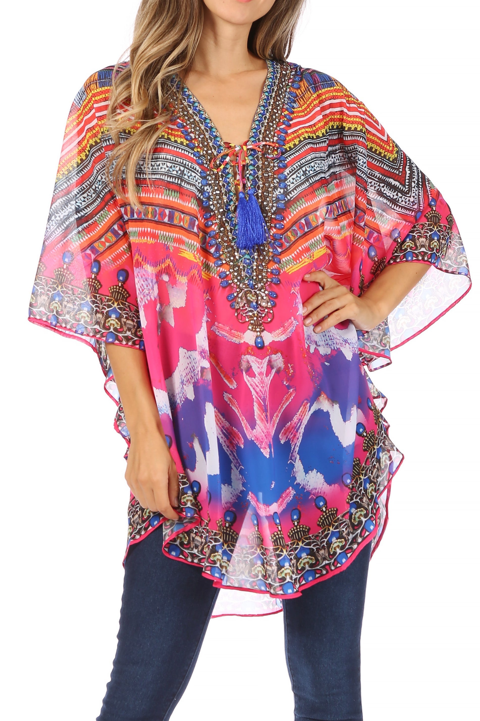 Woman wearing a colorful, patterned kaftan with a white background
