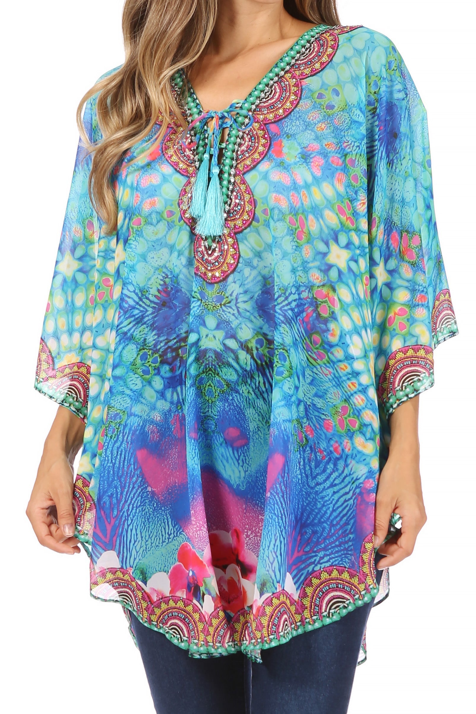 Colorful patterned top worn by a person on a white background