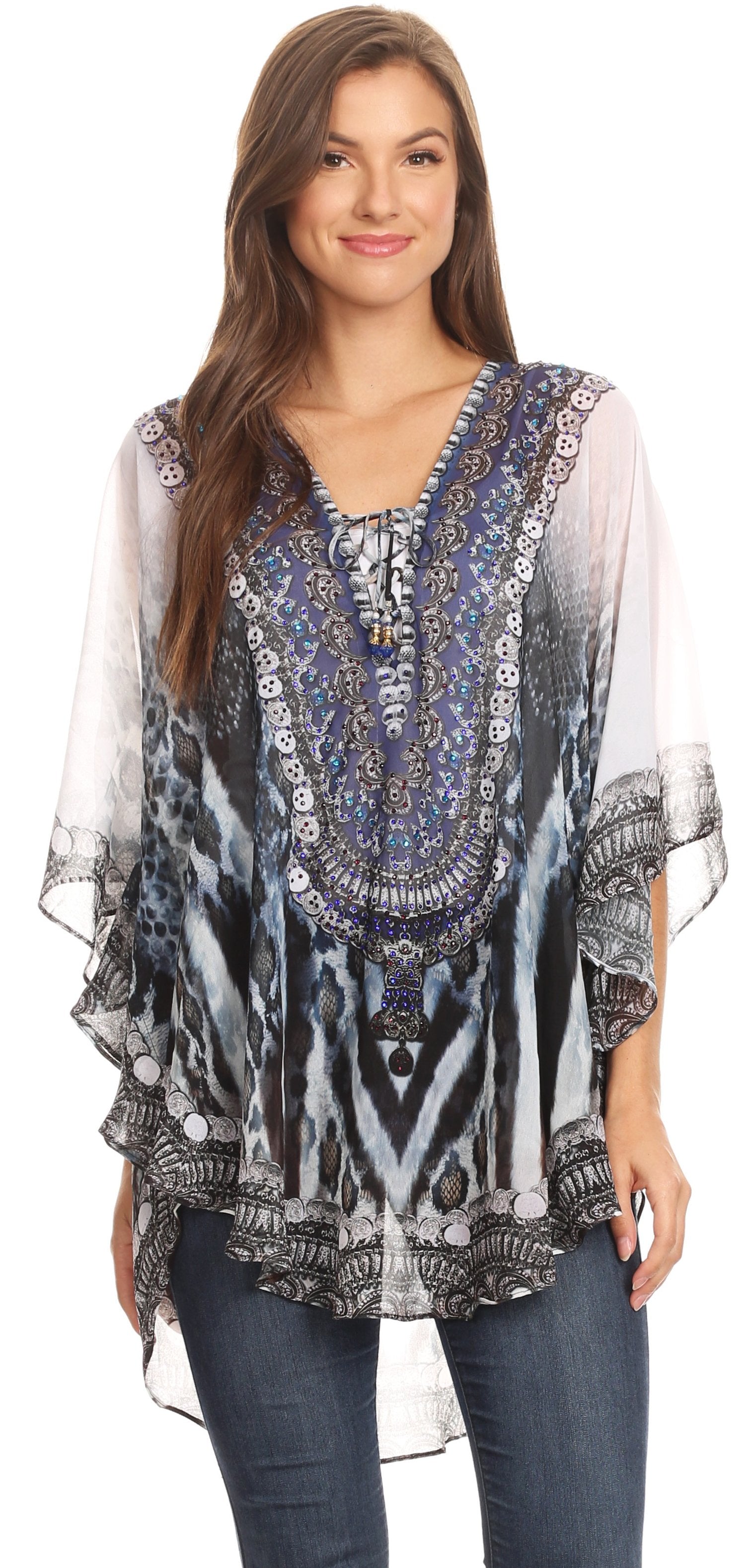 Woman wearing a patterned blouse with sheer sleeves on a white background