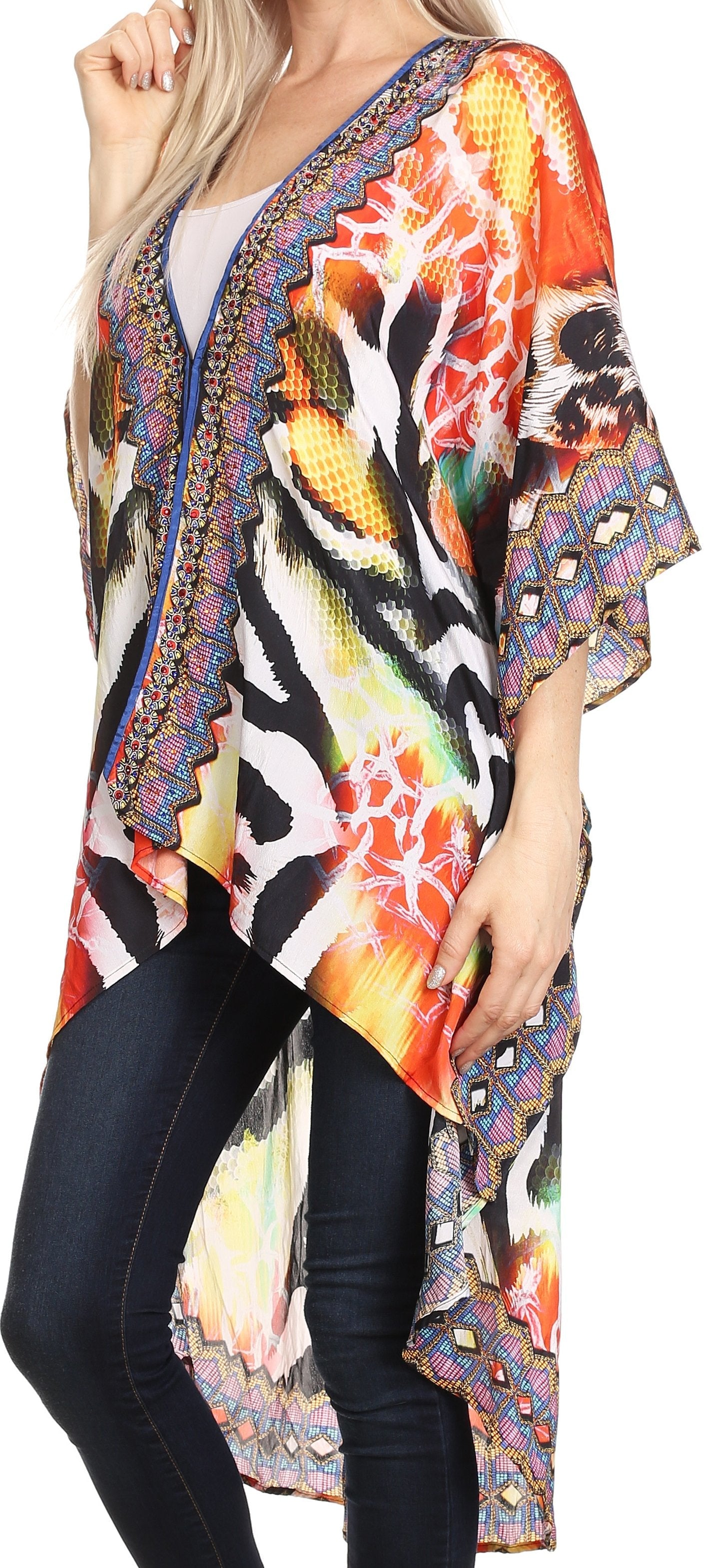 Colorful patterned kimono worn by a person with black pants.