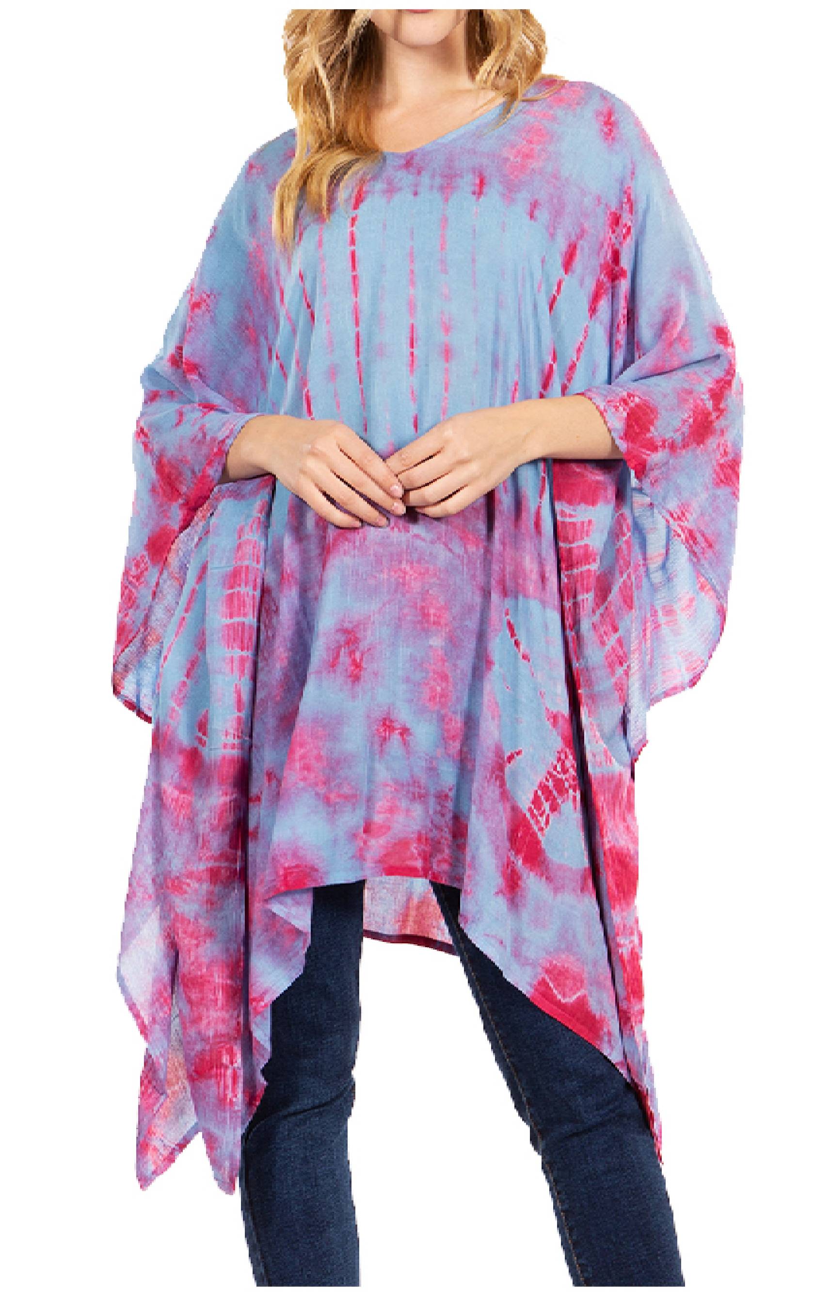 Woman wearing a pink and blue tie-dye poncho on a white background