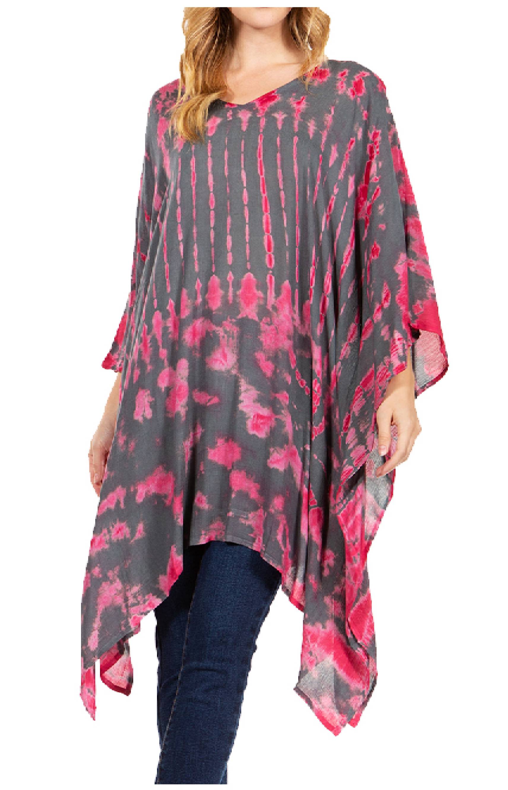 Woman wearing a pink and gray tie-dye poncho on a white background