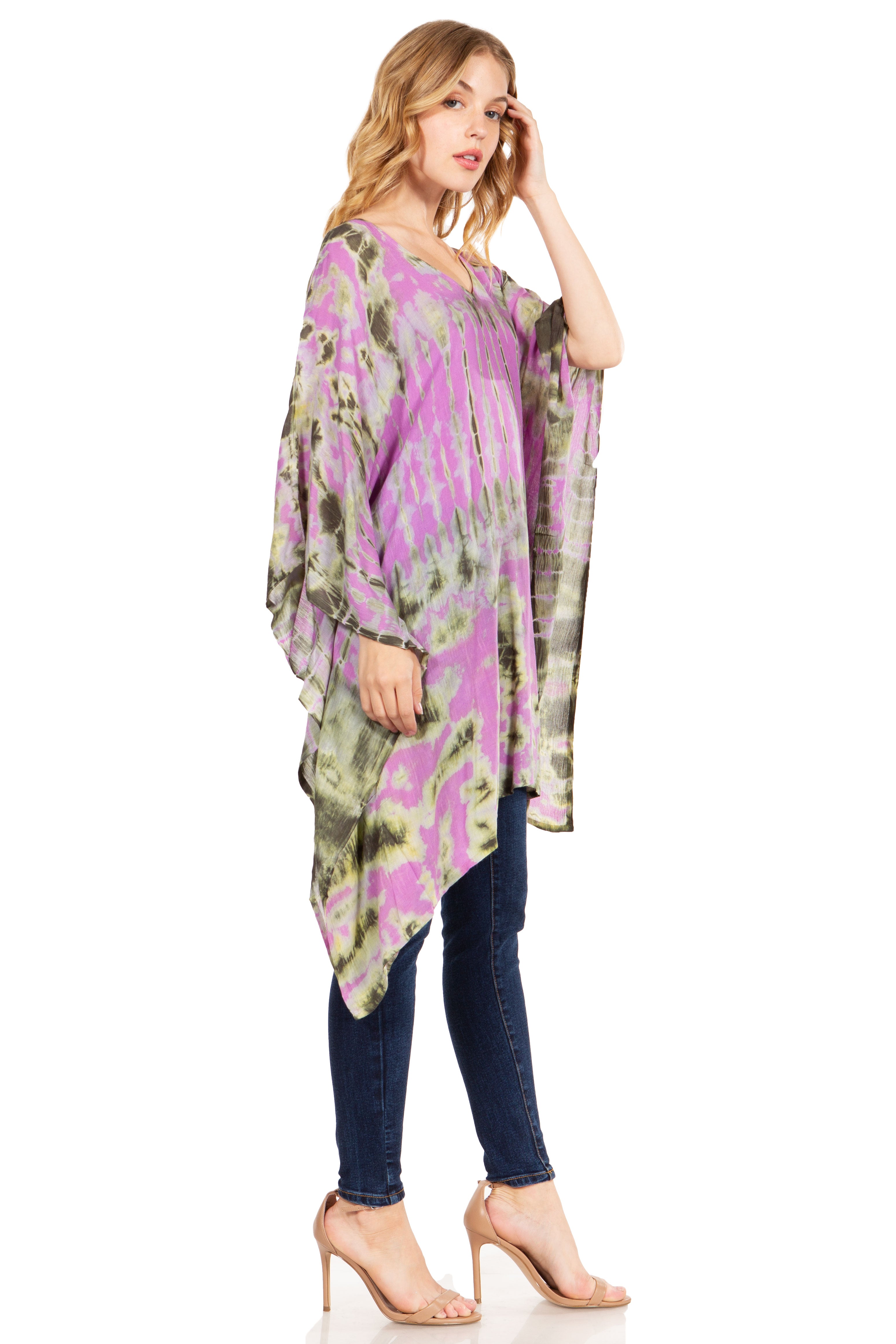 Woman wearing a colorful kimono-style garment on a white background