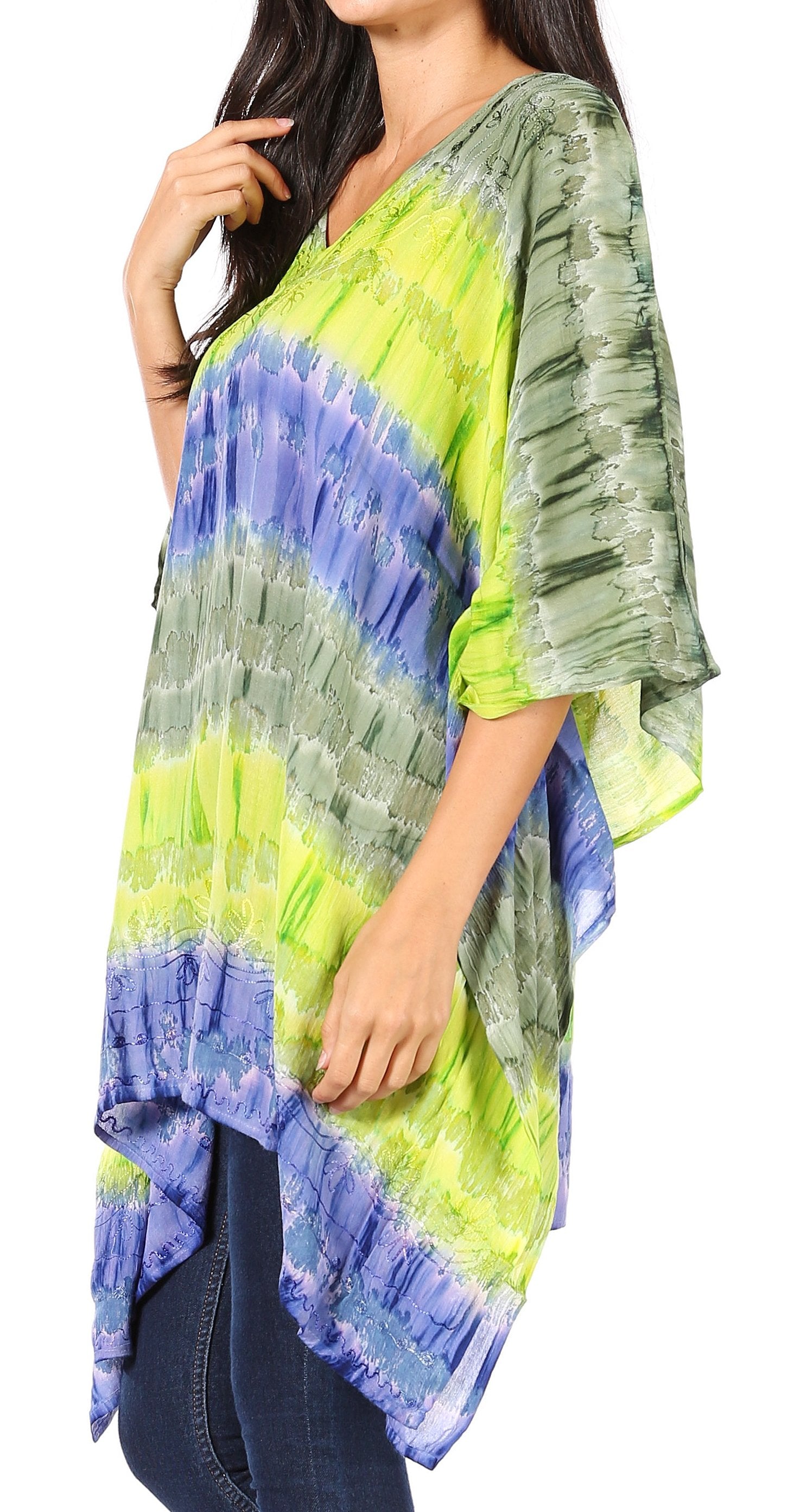 Woman wearing a colorful tie-dye kimono-style top on a white background