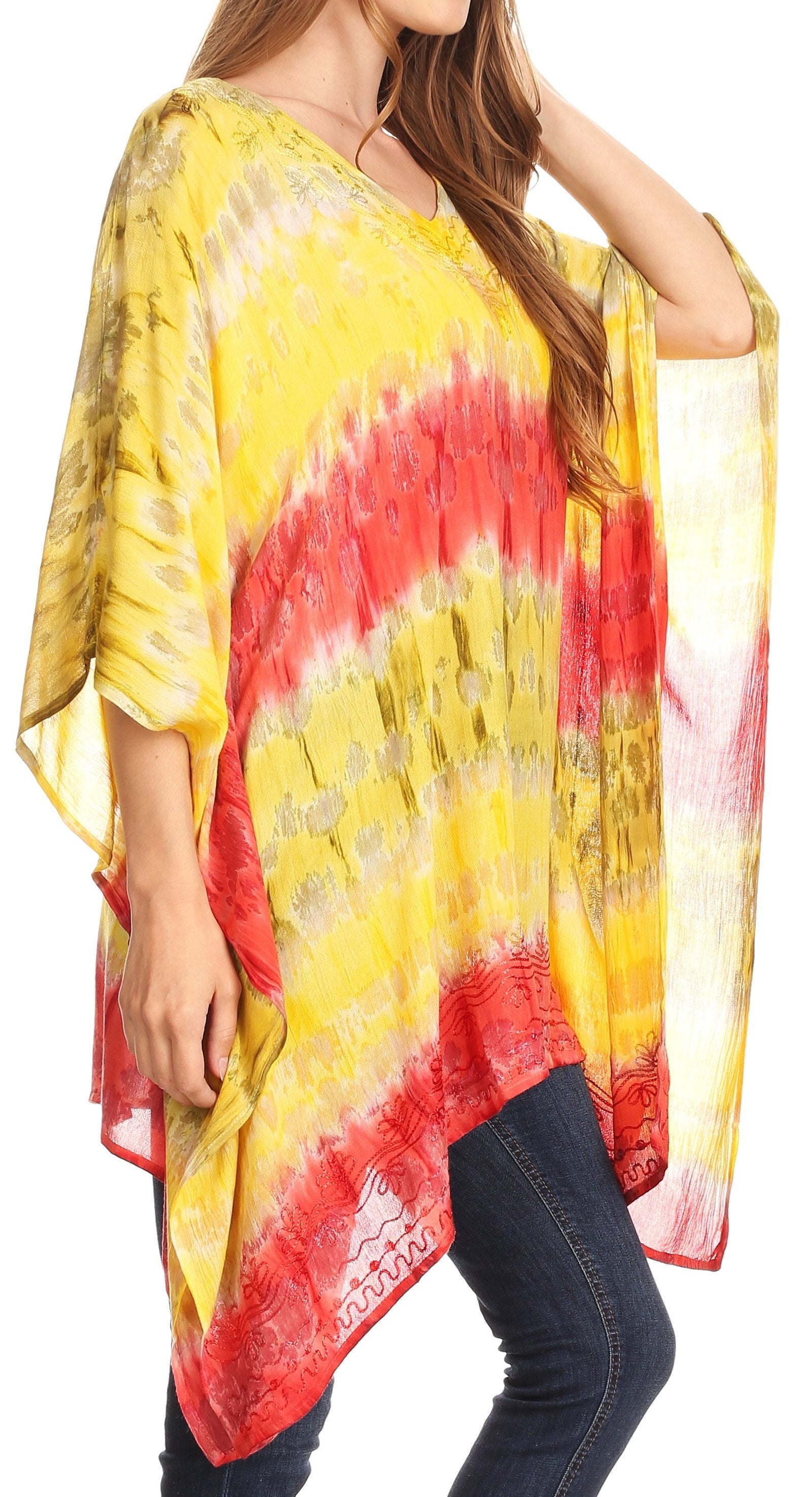 Woman wearing a yellow and red tie-dye kimono-style garment on a white background