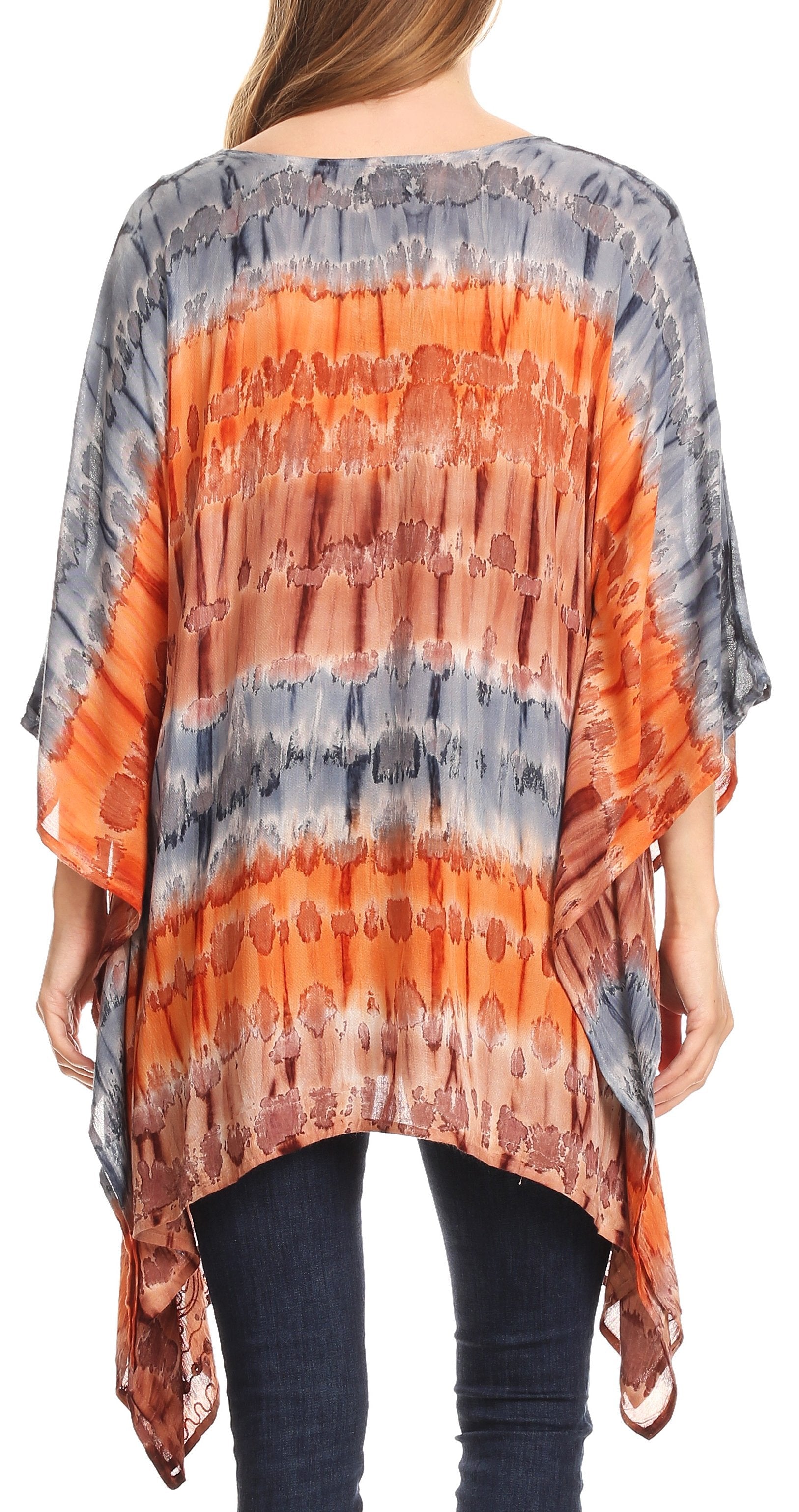 Orange and gray tie-dye poncho worn by a person on a white background