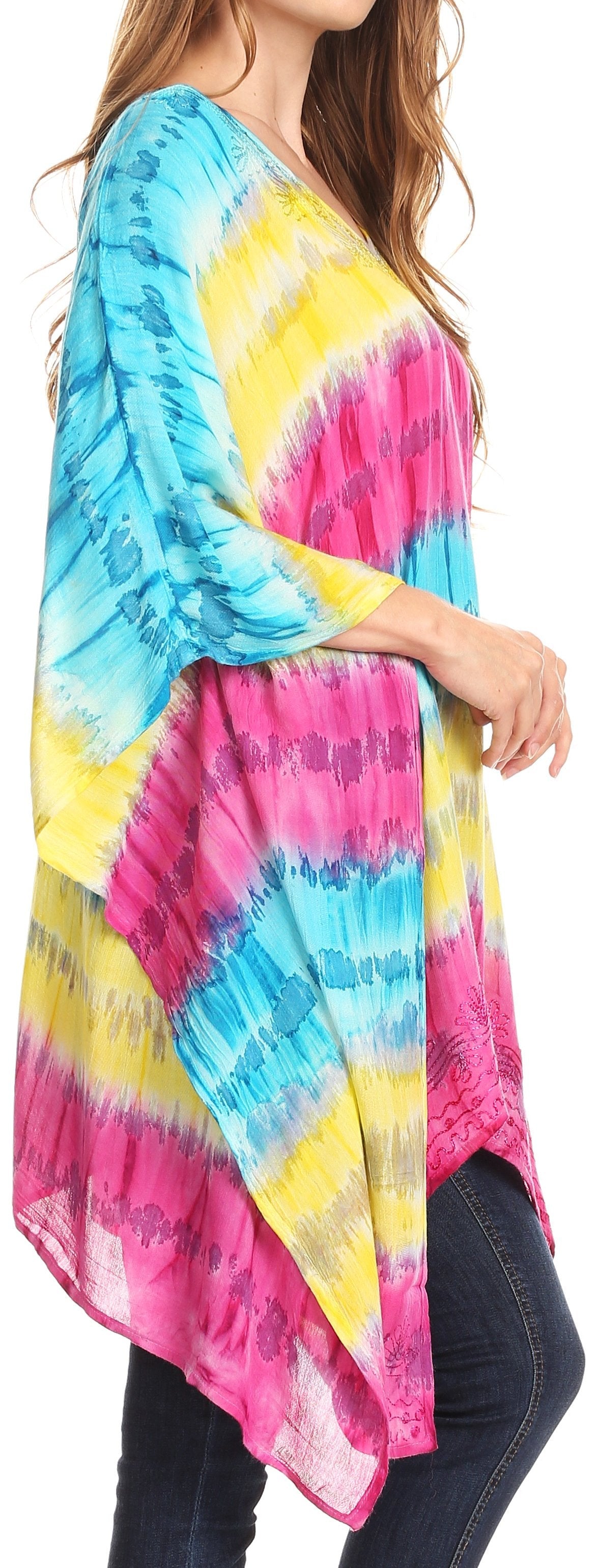 Multicolored tie-dye shirt worn by a person, with a focus on the vibrant colors.