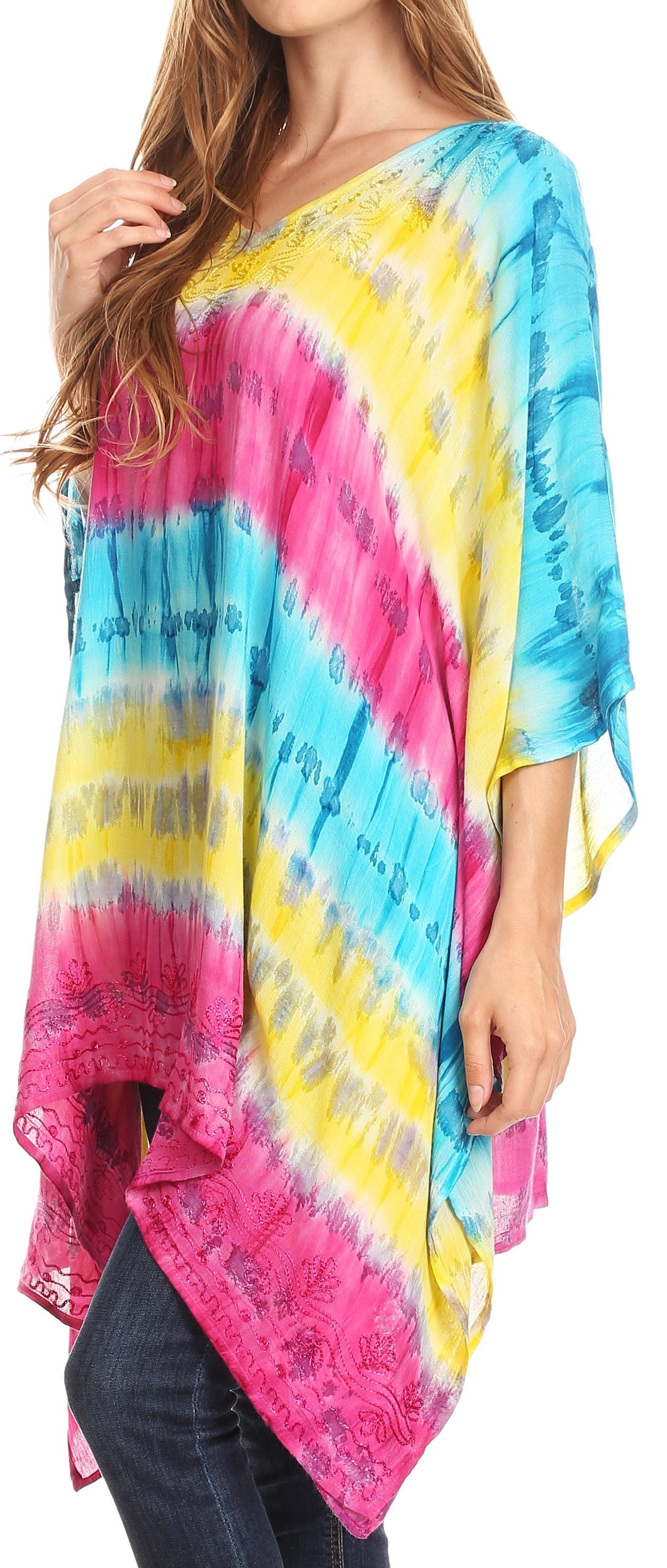 Multicolored tie-dye shirt worn by a person, with a focus on the vibrant colors.