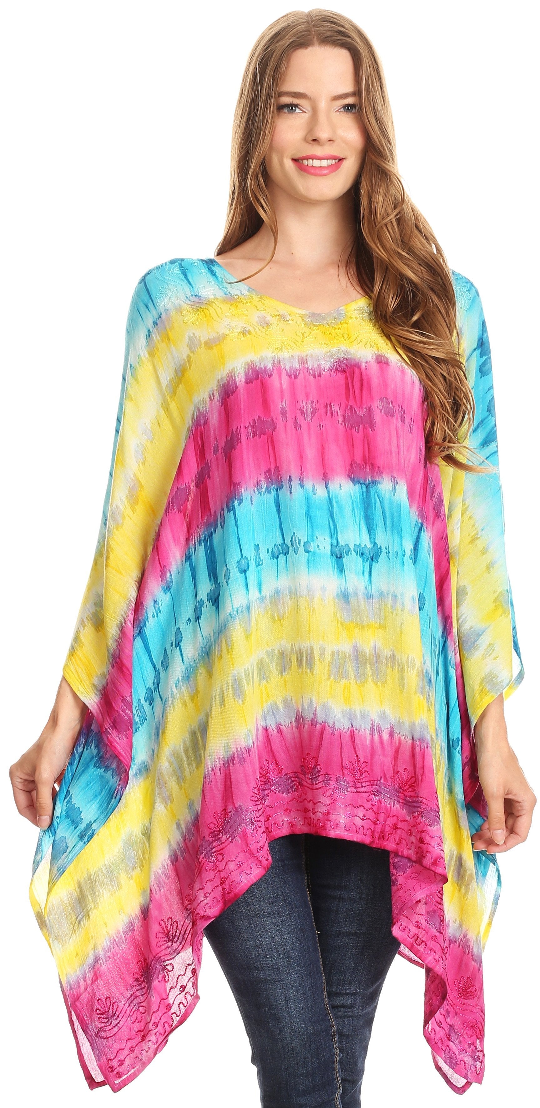 Woman wearing a colorful tie-dye poncho with a white background