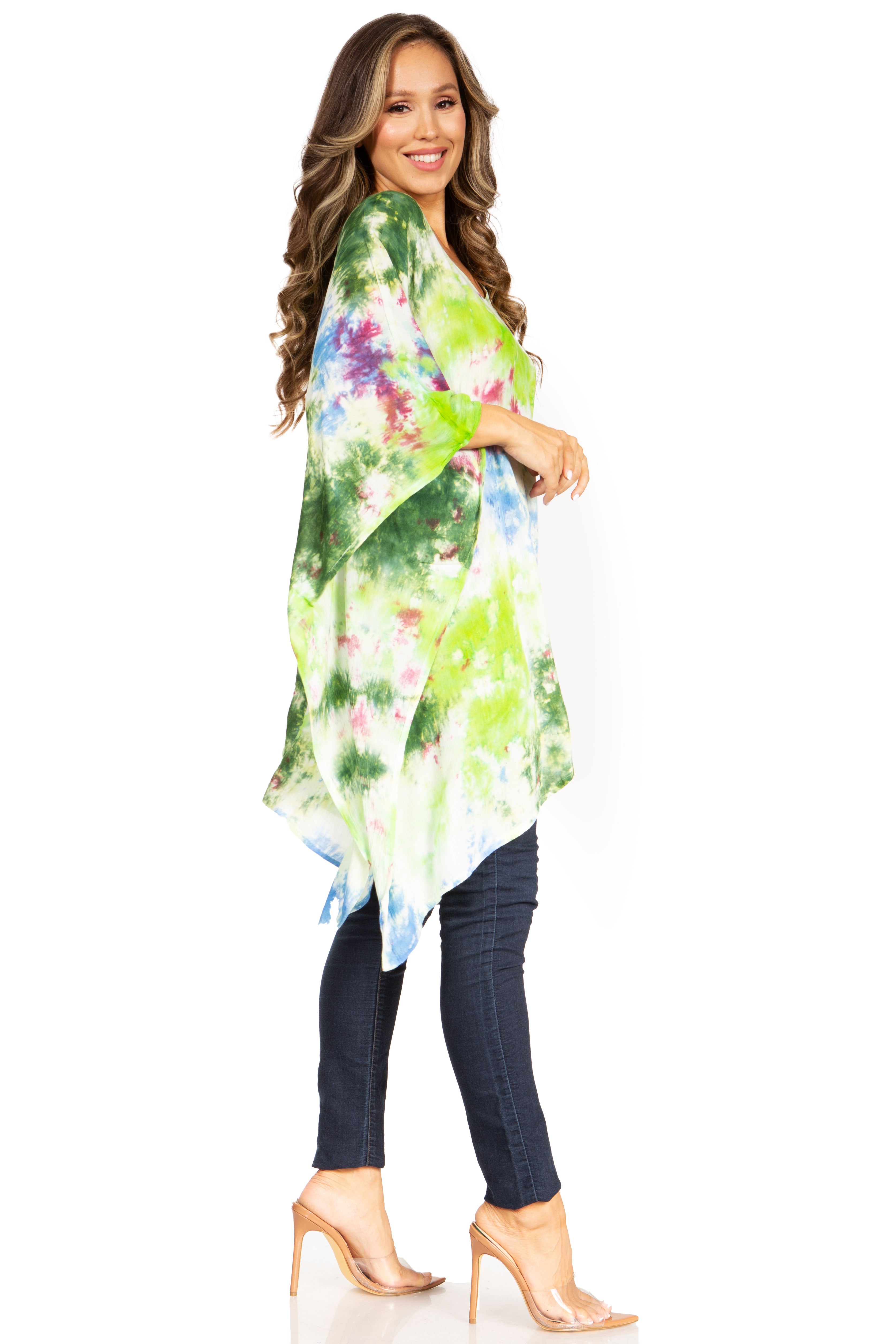 Woman wearing a colorful floral kimono-style garment on a white background