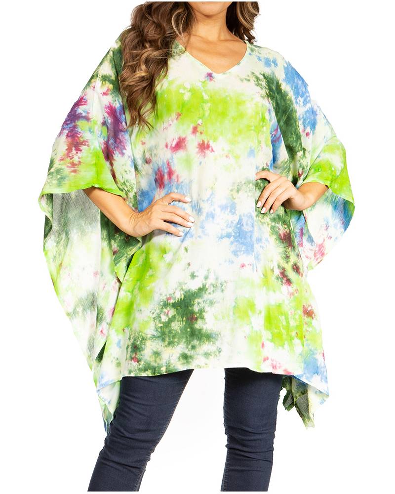 Multicolored tie-dye poncho worn by a person on a white background