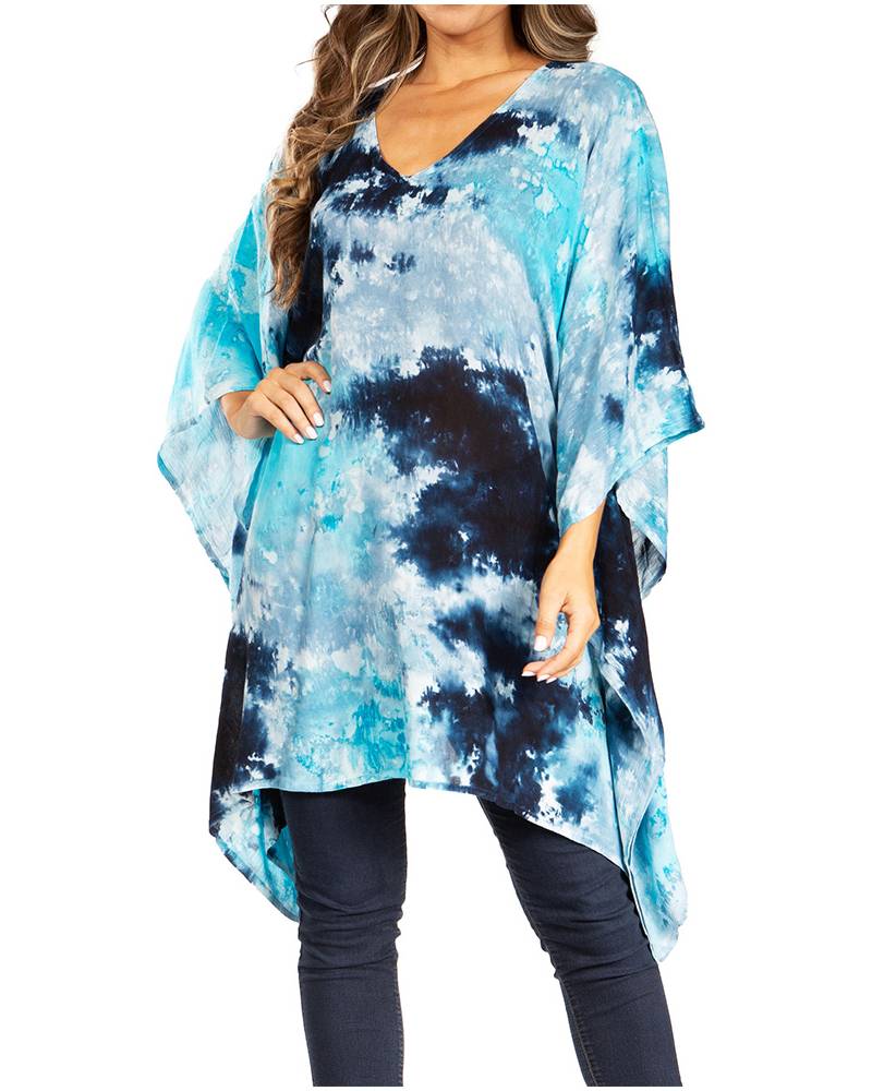 Blue tie-dye top worn by a person on a white background