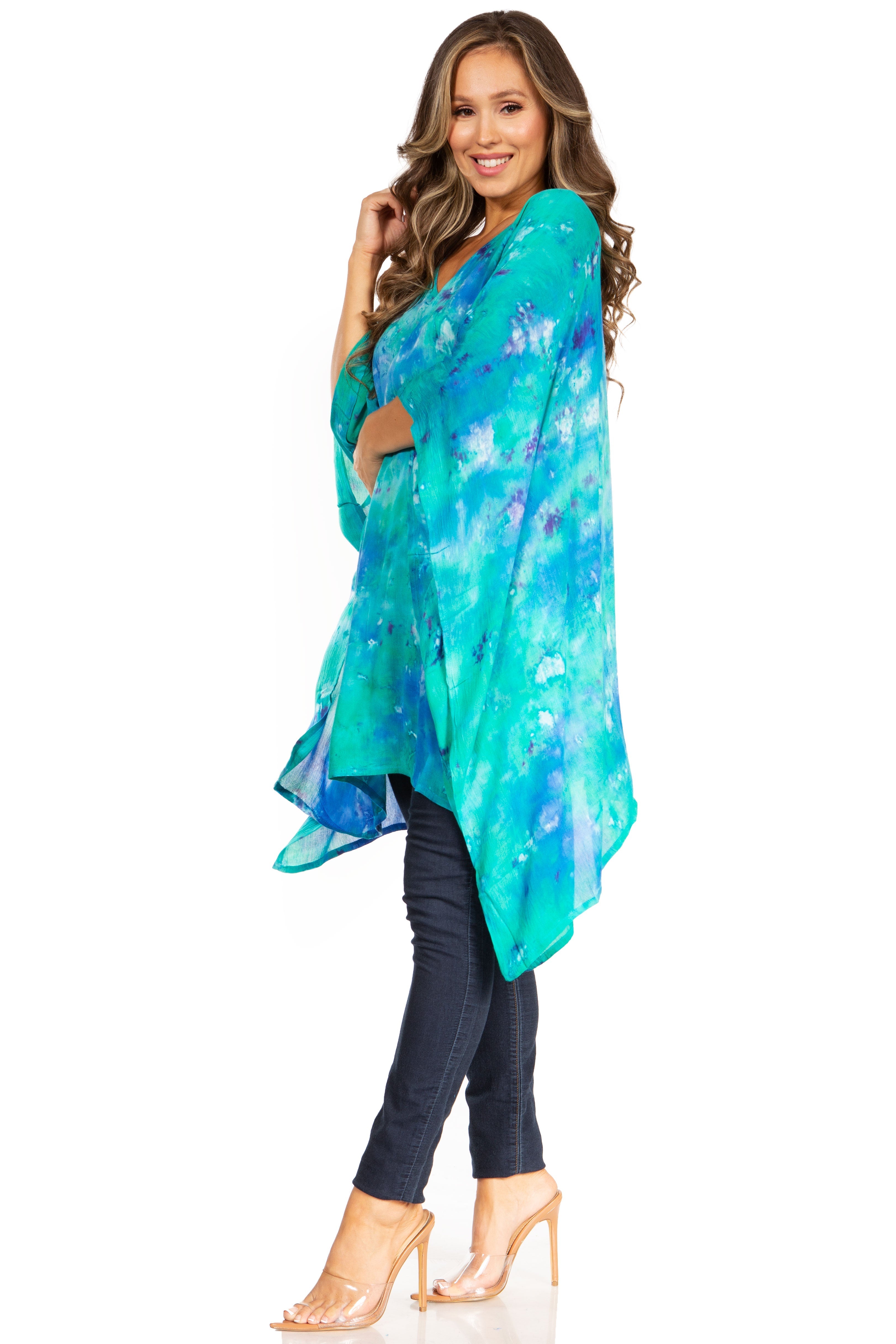 Woman wearing a colorful scarf with a white background